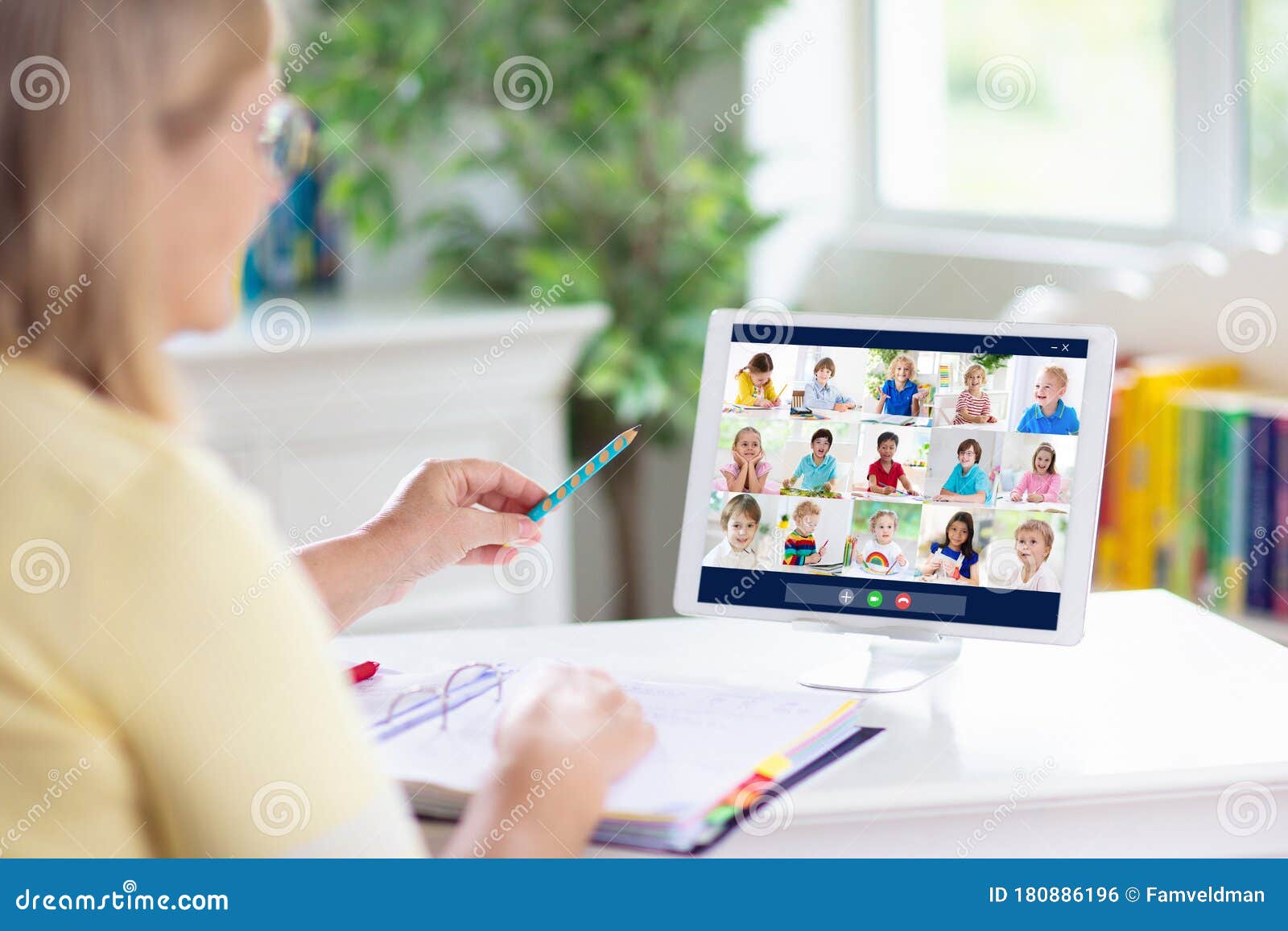 online remote learning. teacher with computer