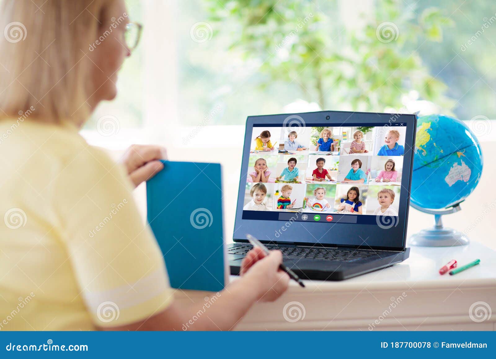 online remote learning. teacher with computer