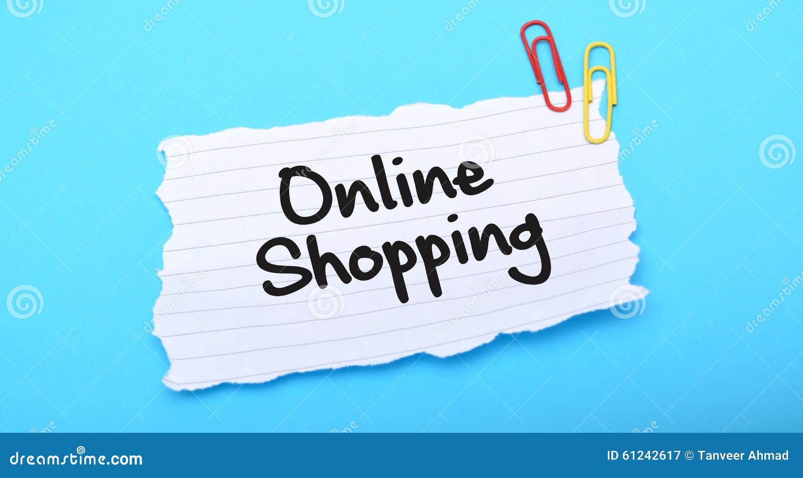 online-shopping-written-paper-blue-background-61242617.jpg