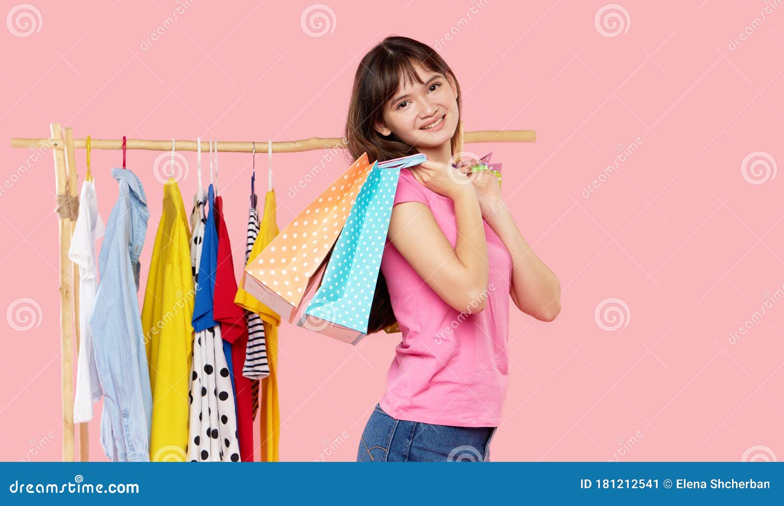 Online Shopping. Young Asian Woman With Shopping Bags Tries On Colorful ...