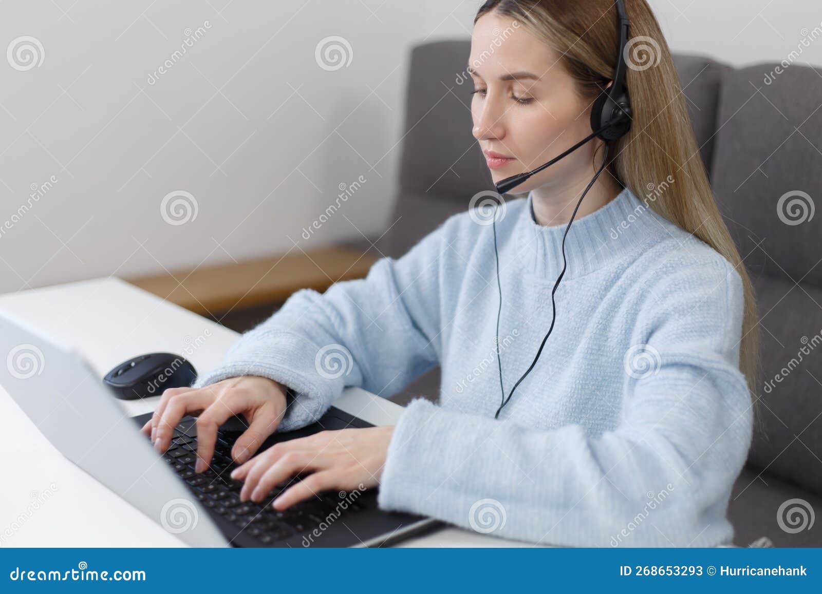 Online Support Assistant Works on Laptop at Home. Call Center Operator Working on Modern