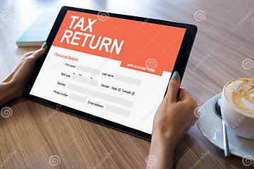 Online Tax Return Application On Screen Business And Finance Concept 