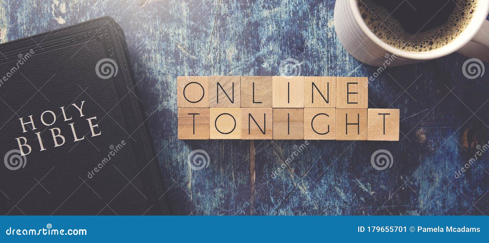 online tonight written in block letters on a blue wood table with a bible
