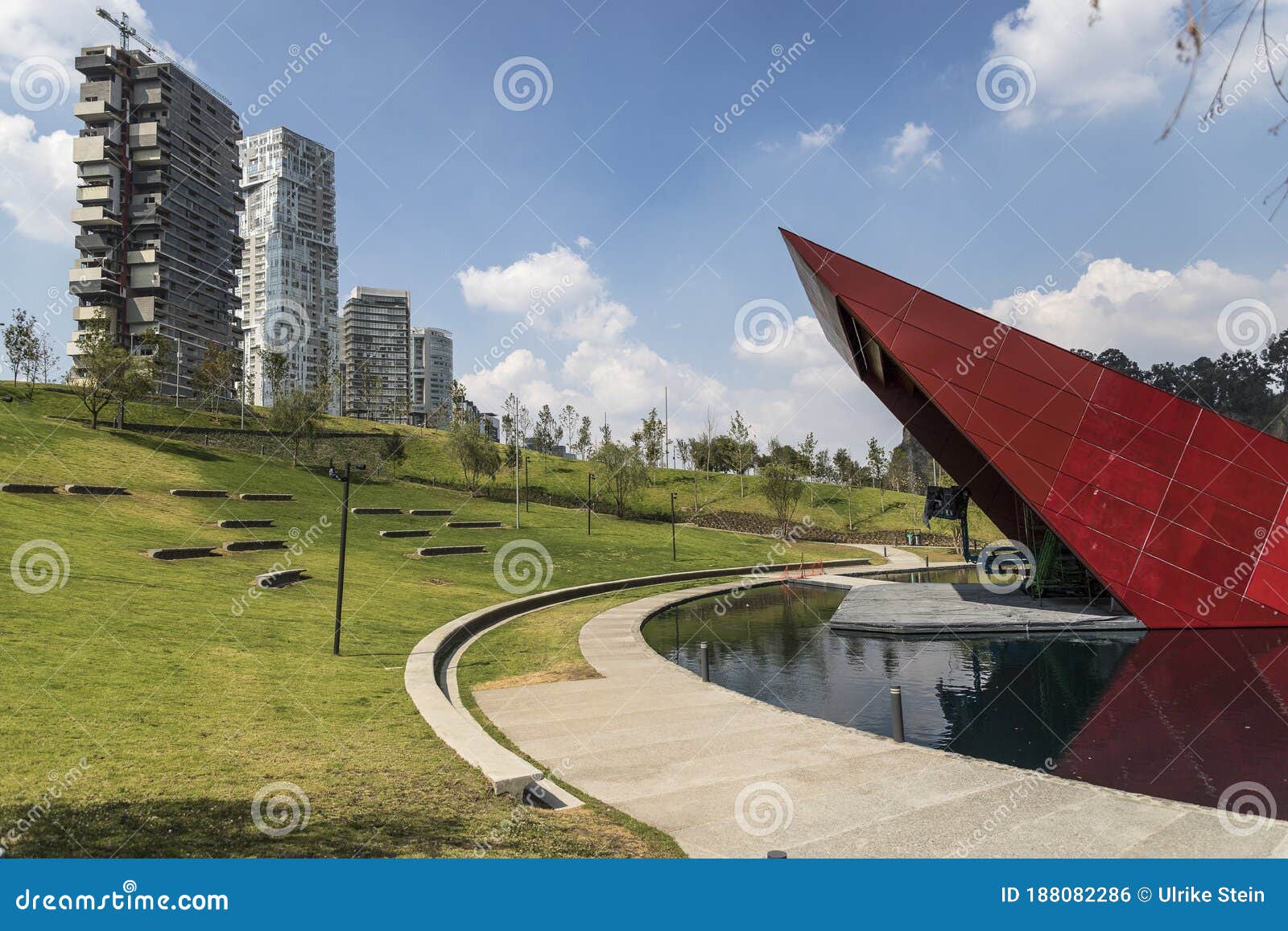 open air forum and artifical lake inside la mexicana urban park in santa fe, mexico city