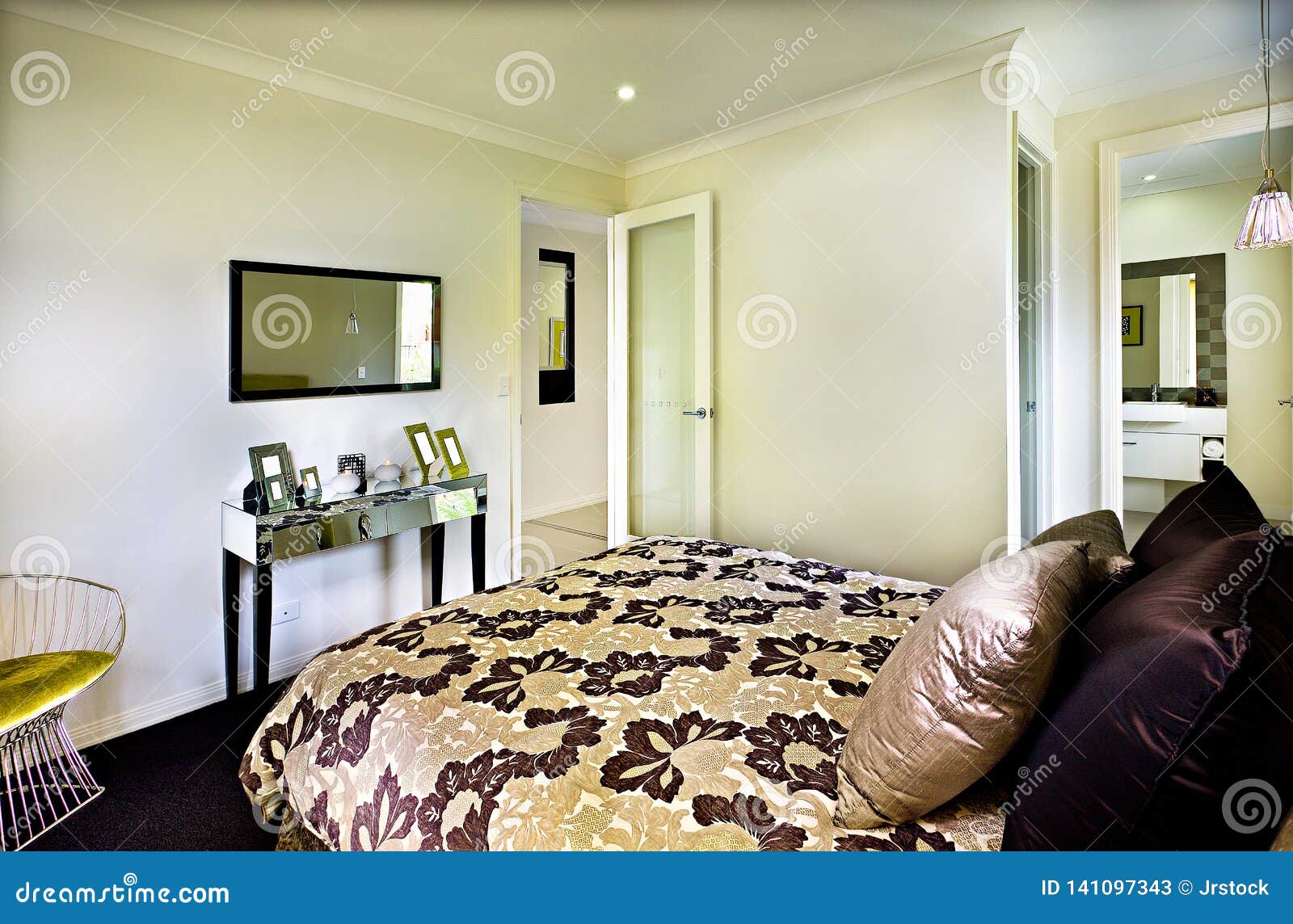 Open Bedroom In The Modern House With Shiny Pillows Stock