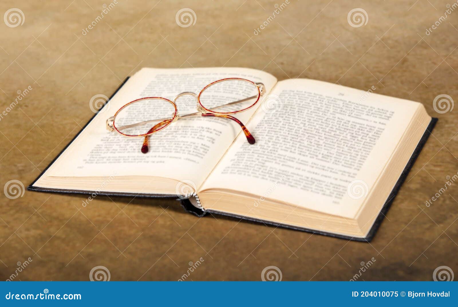 Open book with glasses stock image. Image of study, hardback 204010075