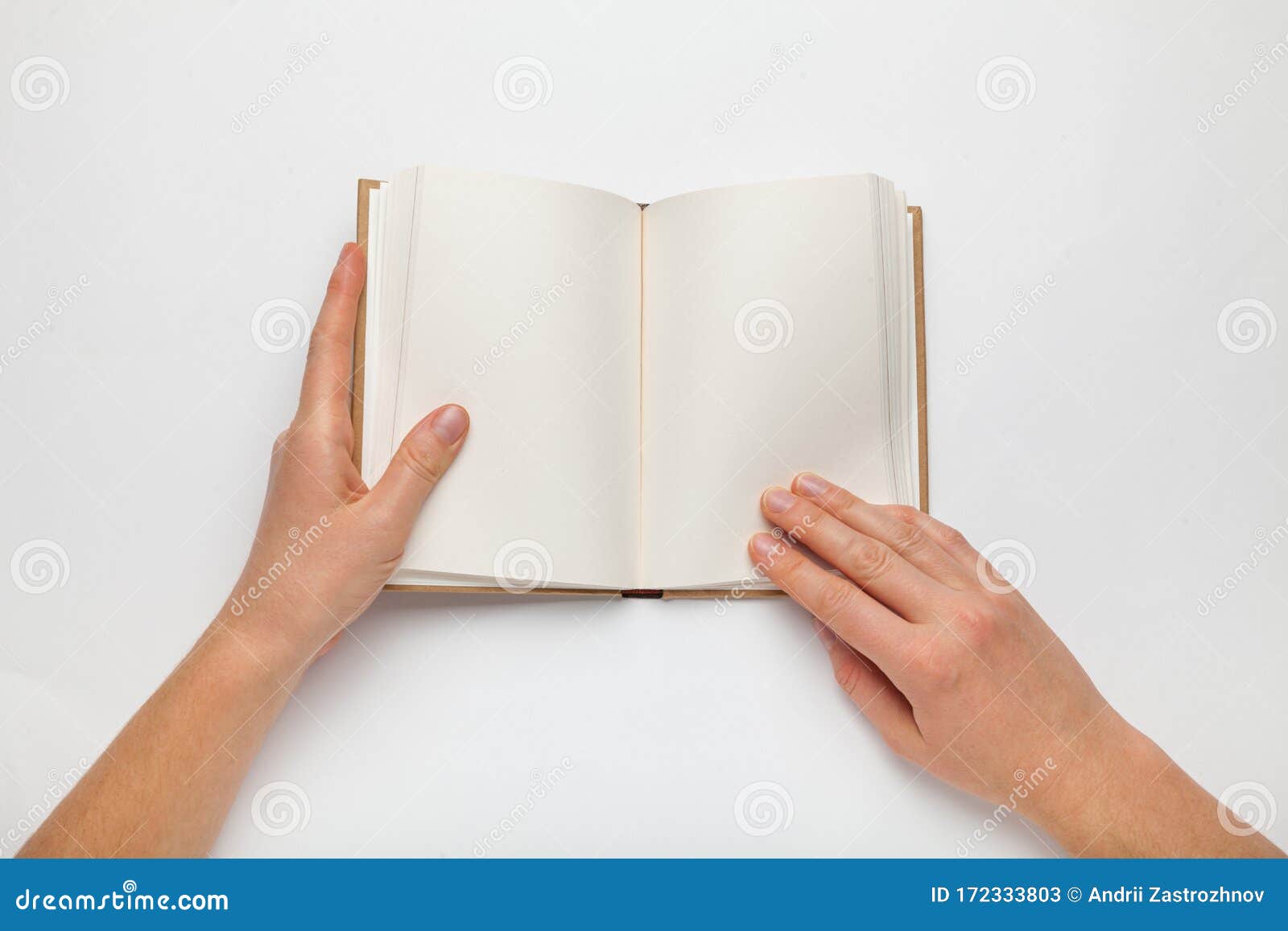 Hand Opening White Journal with Blank Pages Mockup. Stock Image