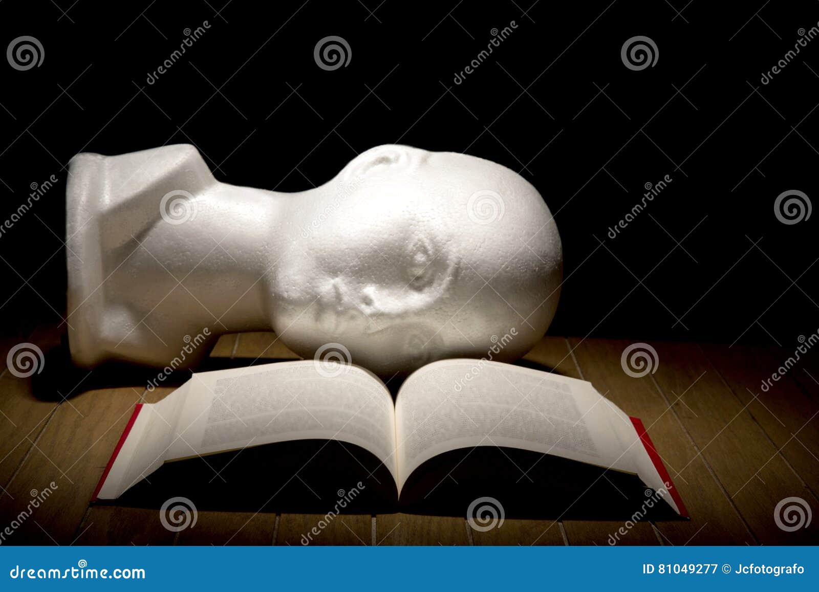 open book on wood background
