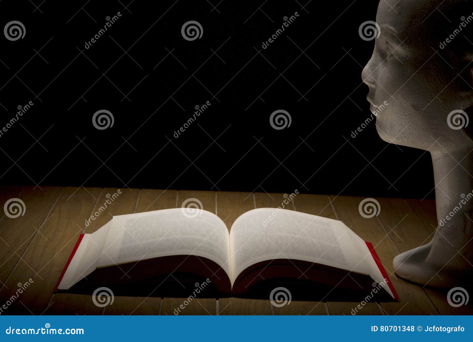 open book on wood background