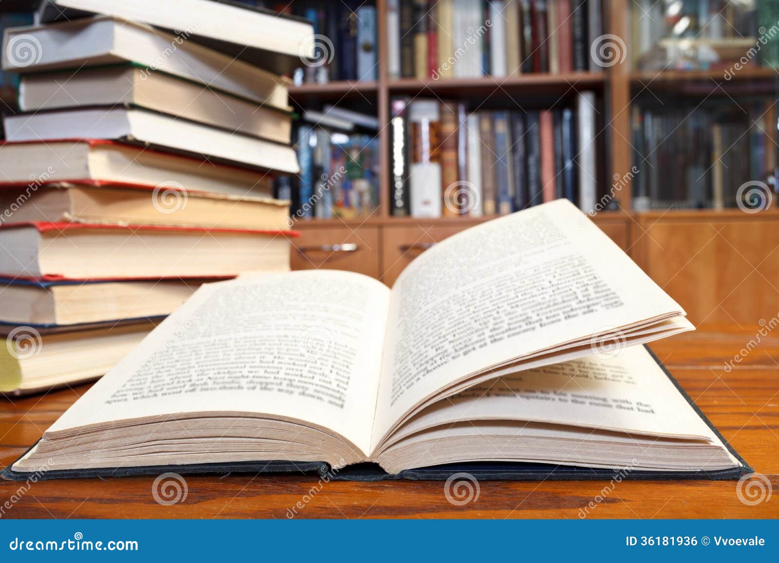 Open book on wooden table stock photo. Image of blur 