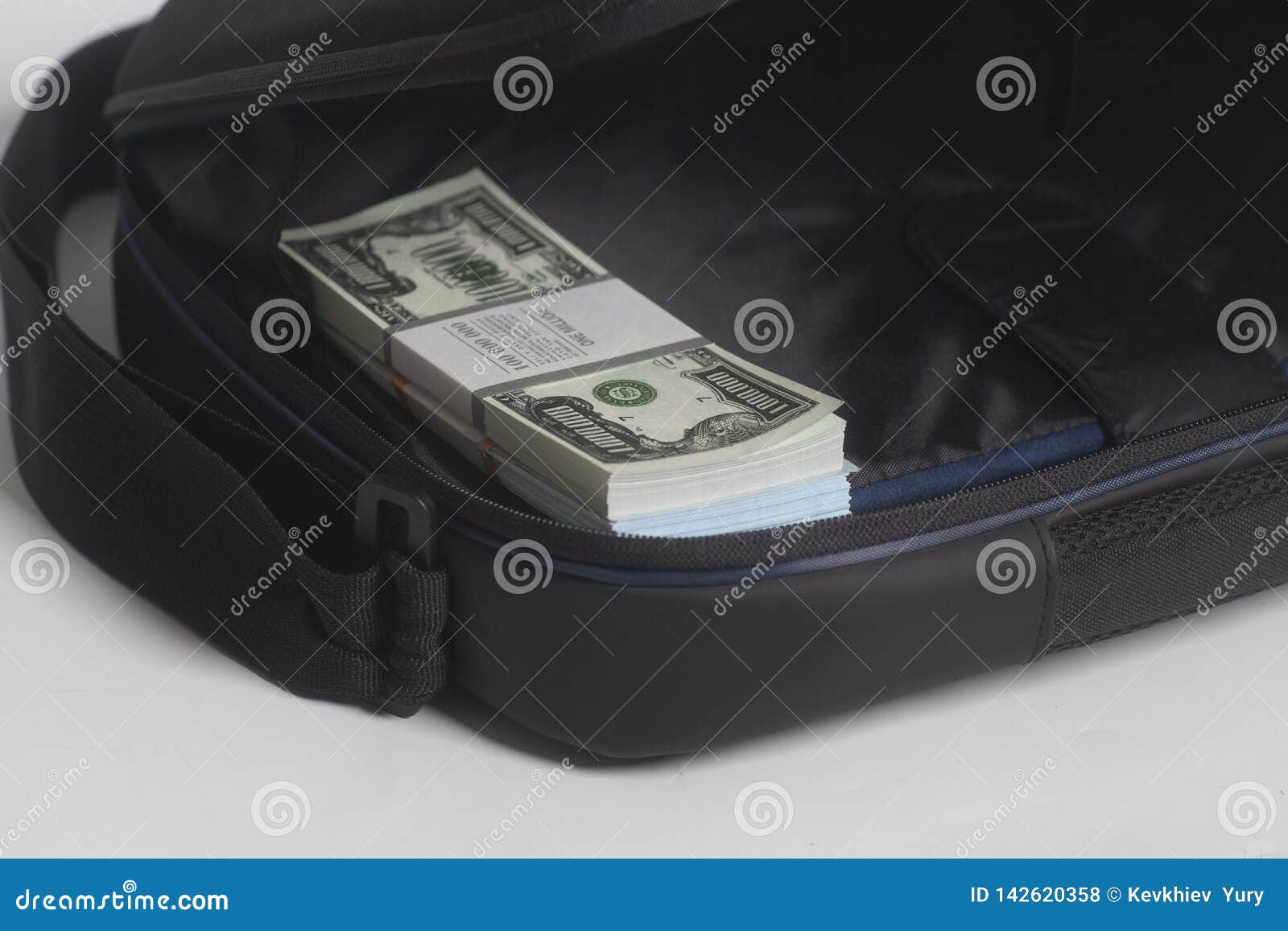 Open Briefcase with One Million Dollars Bills with Tape Stock Photo