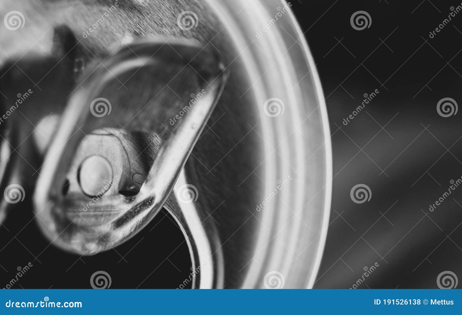 An Open Can of Carbonated Beverage with a Ring for Opening Cans. Open