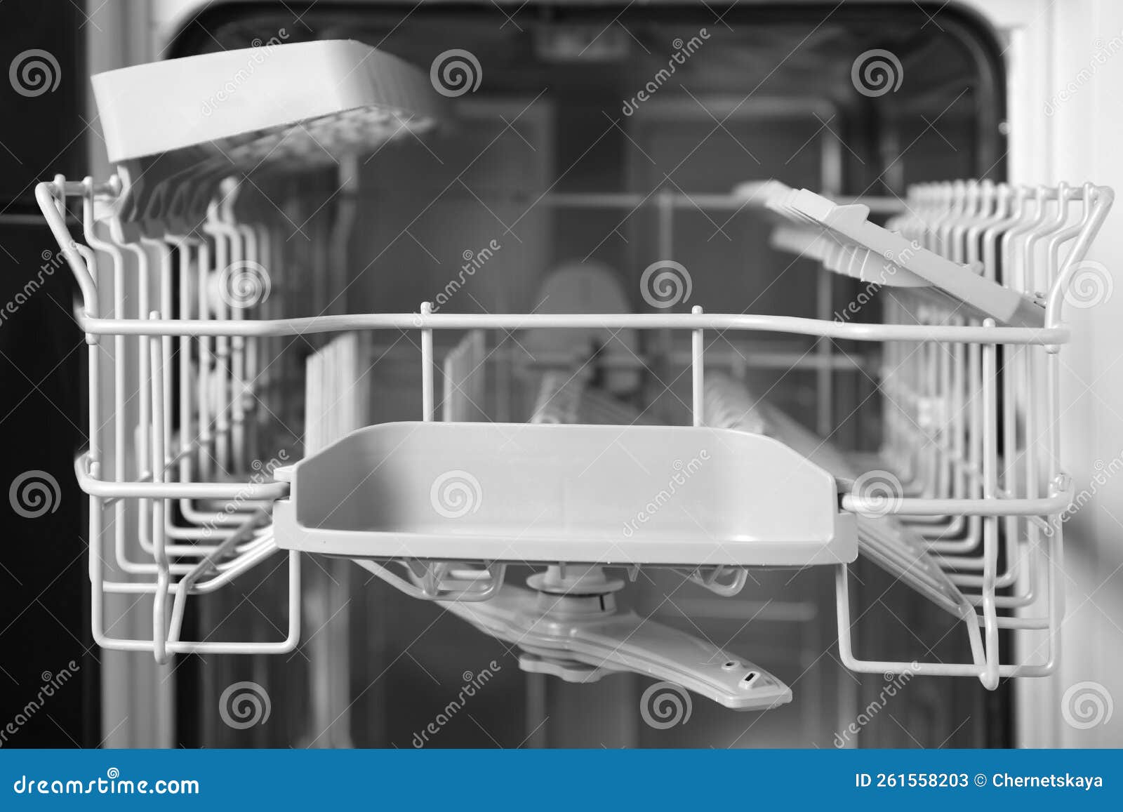 Open Clean Modern Empty Automatic Dishwasher Machine, Closeup Stock