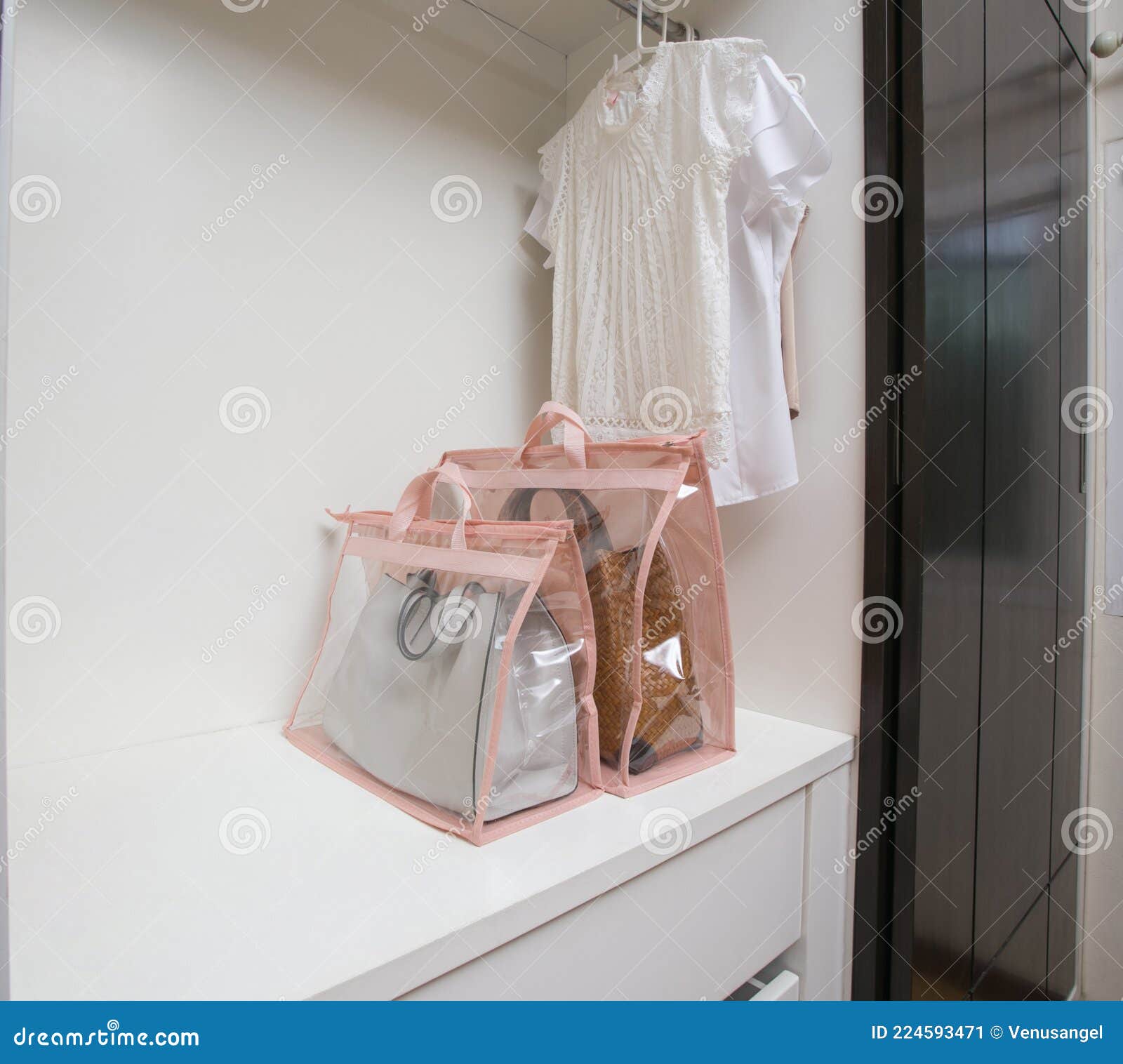 Open Closet with Clothes and Bags and Empty Space Stock Image Image