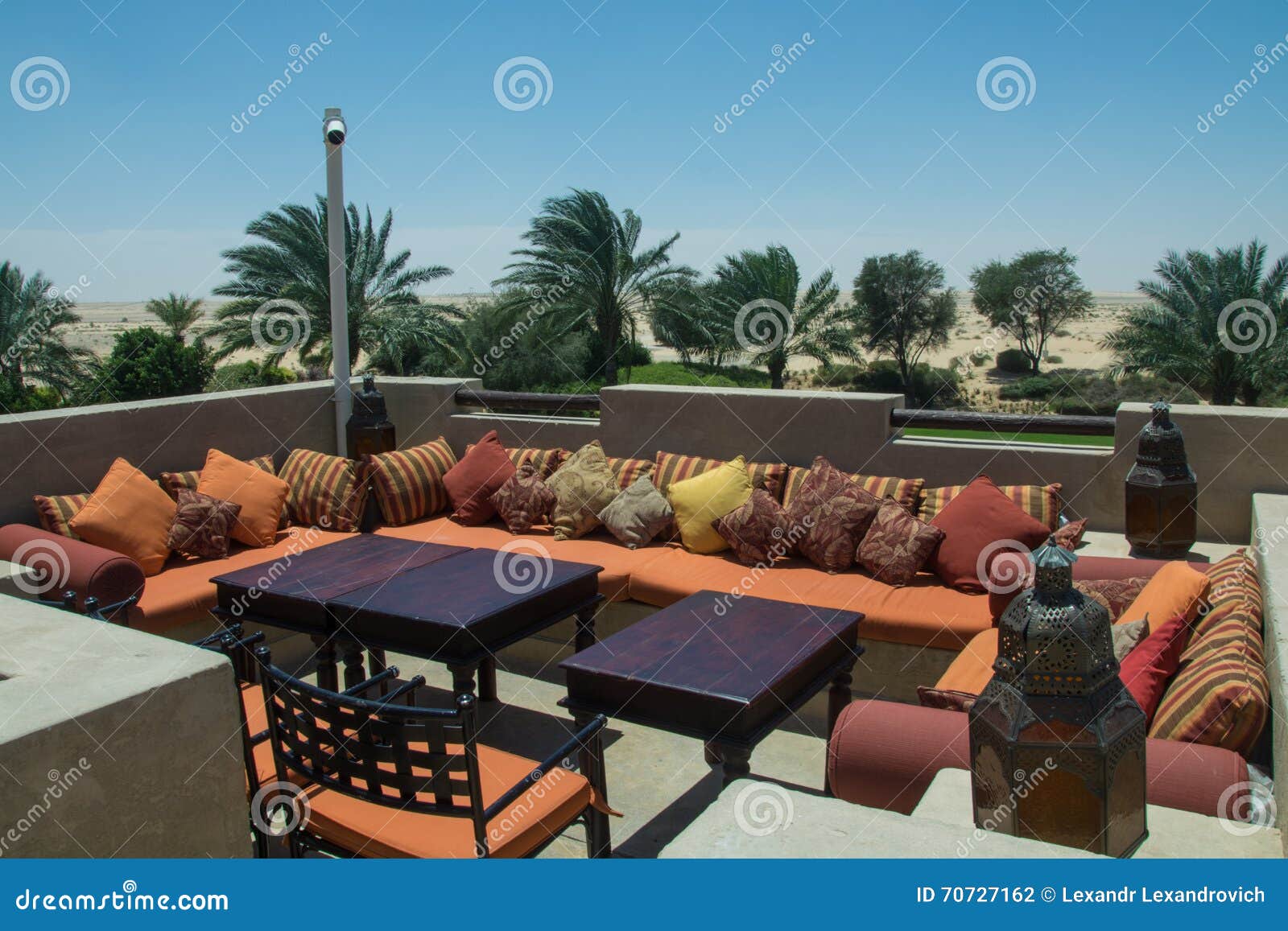 Open Comfortable Restaurant Lounge with Tables, Sofas and Pillows Stock