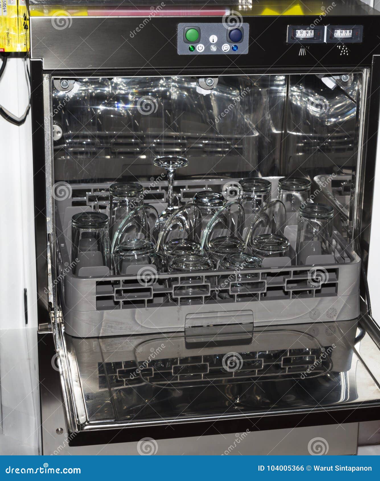 Open Dishwasher with Clean Glass, Cups, Plates and Dishes Stock Photo