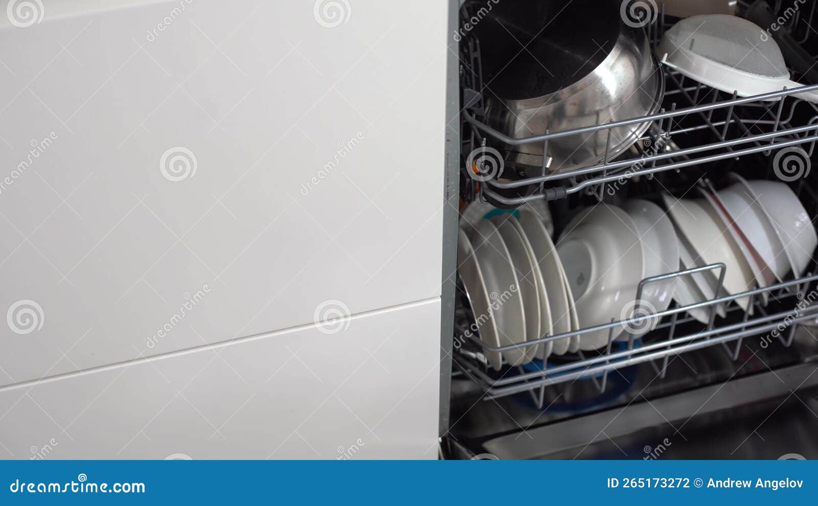 Open Dishwasher with Clean Utensils in it. Stock Photo Image of full