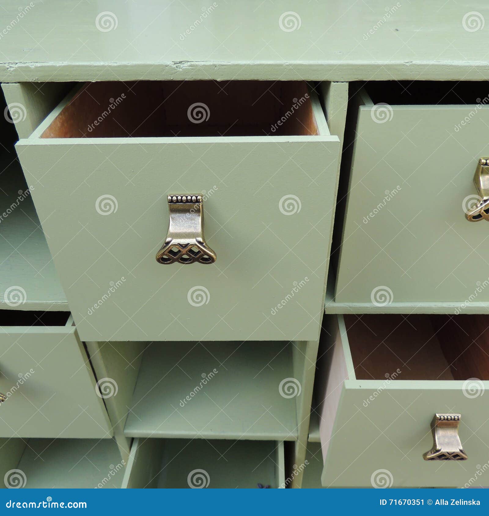 Open Drawers Green Dresser With Openwork Handles Stock Image