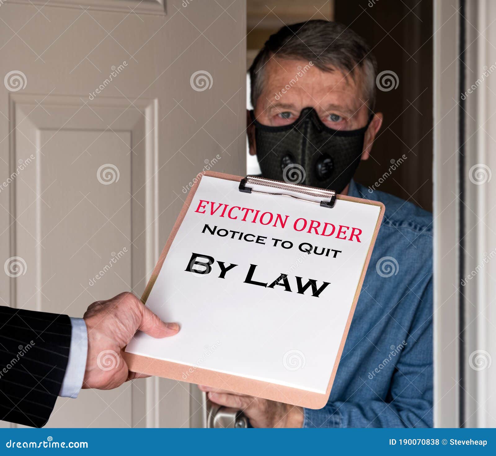 man in suit giving eviction notice to renter or tenant of home