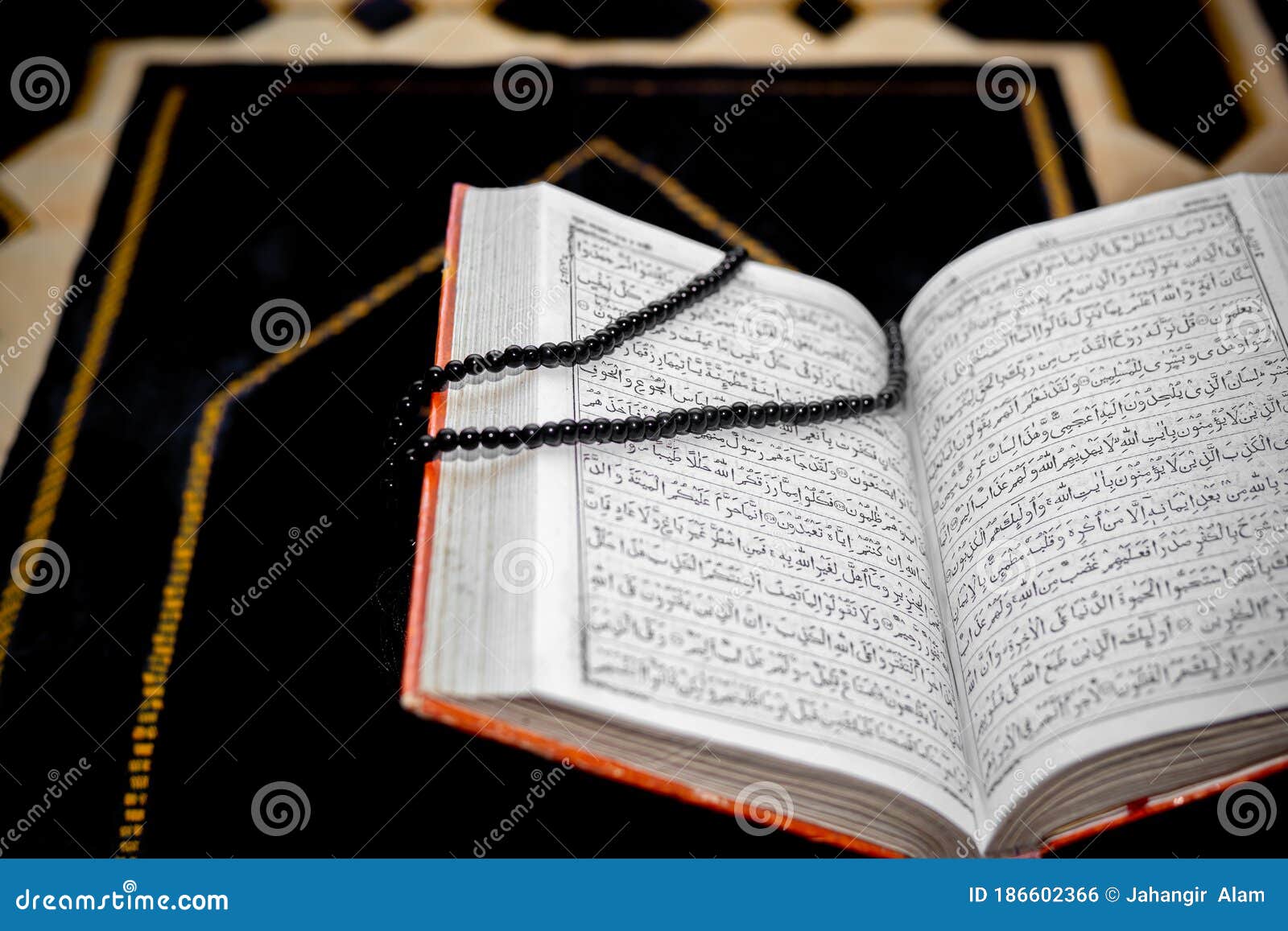 An Open the Holy Quran with Black Tasbeeh. Stock Photo - Image of ...