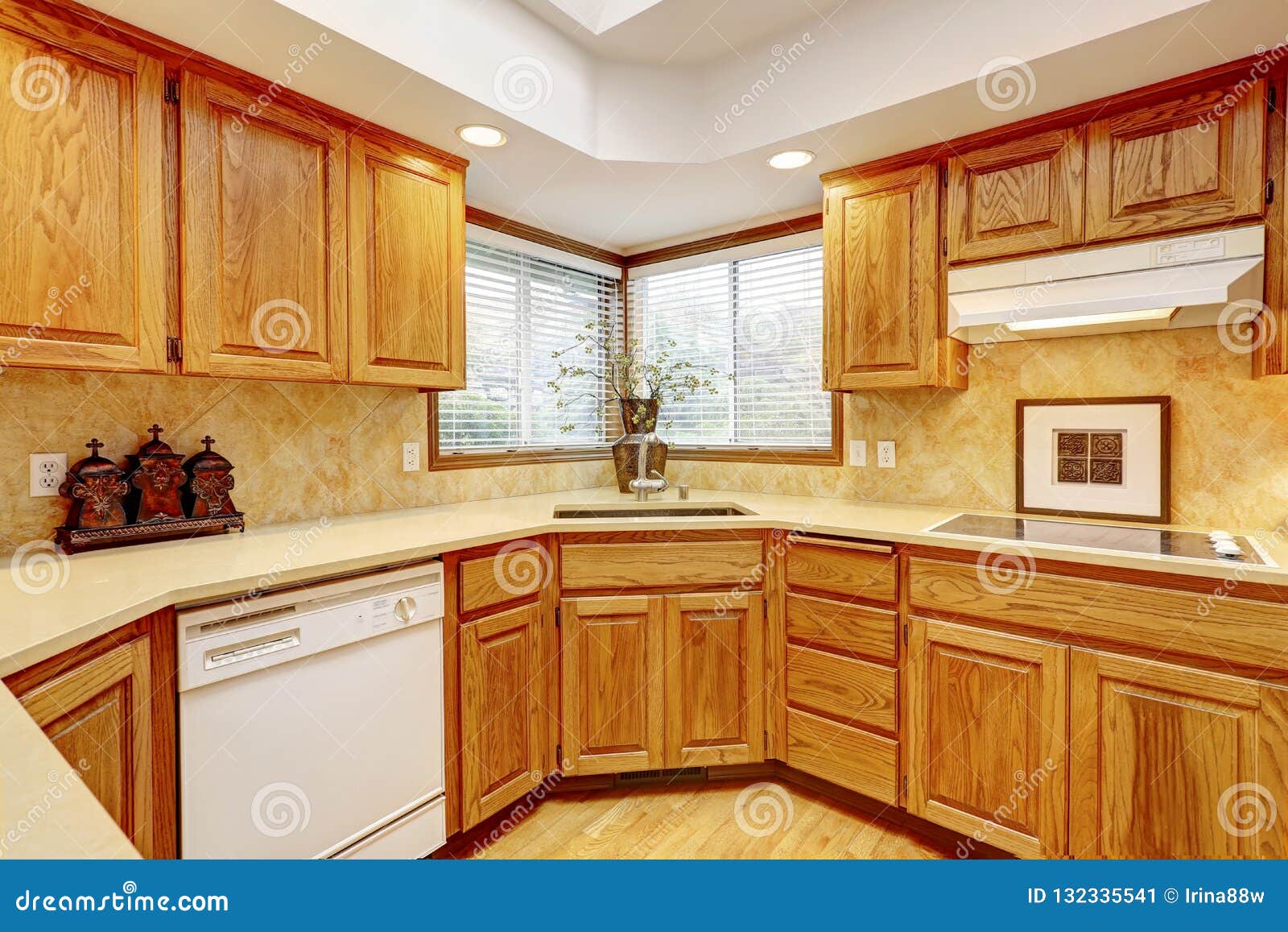 Open Large Kitchen Interior With Vaulted Ceiling And White