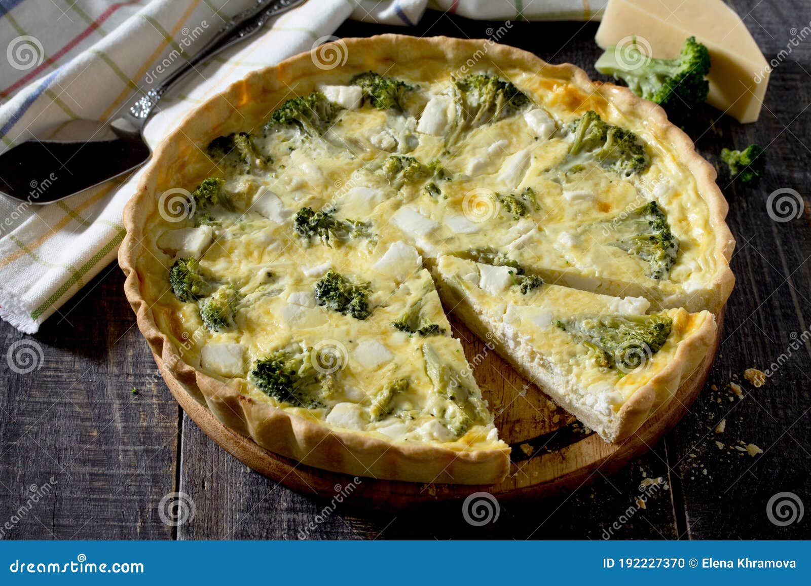 Open Pie Quiche Lauren with Broccoli and Cheese on a Dark Wooden Table ...