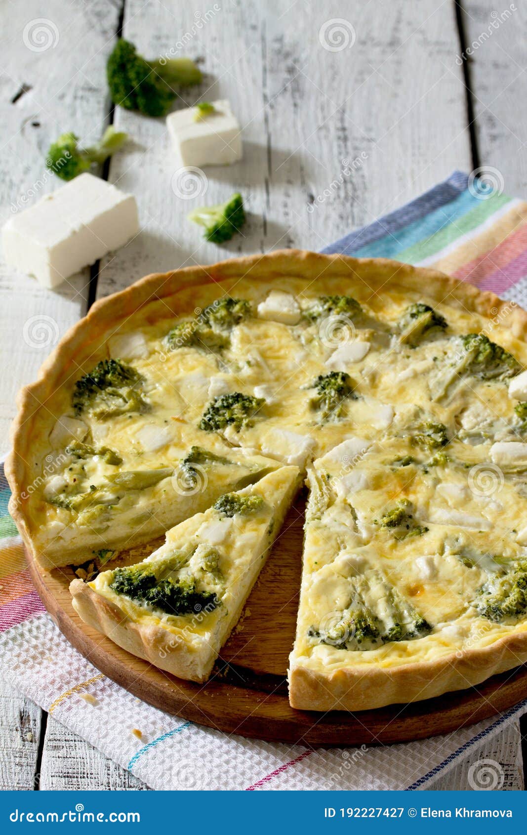 Open Pie Quiche Lauren with Broccoli on a White Wooden Table Stock ...