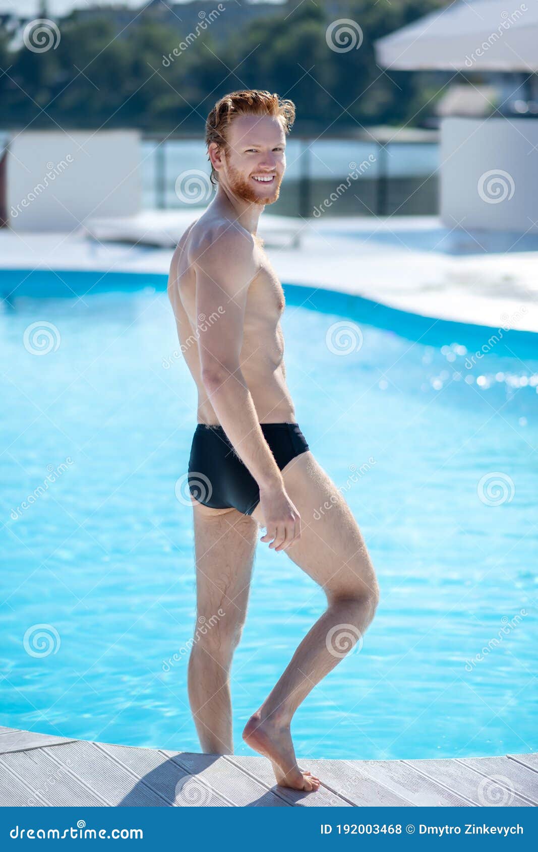 Tall Athletic Man Turning Back Near the Pool. Stock Photo - Image of  athlete, standing: 192003468