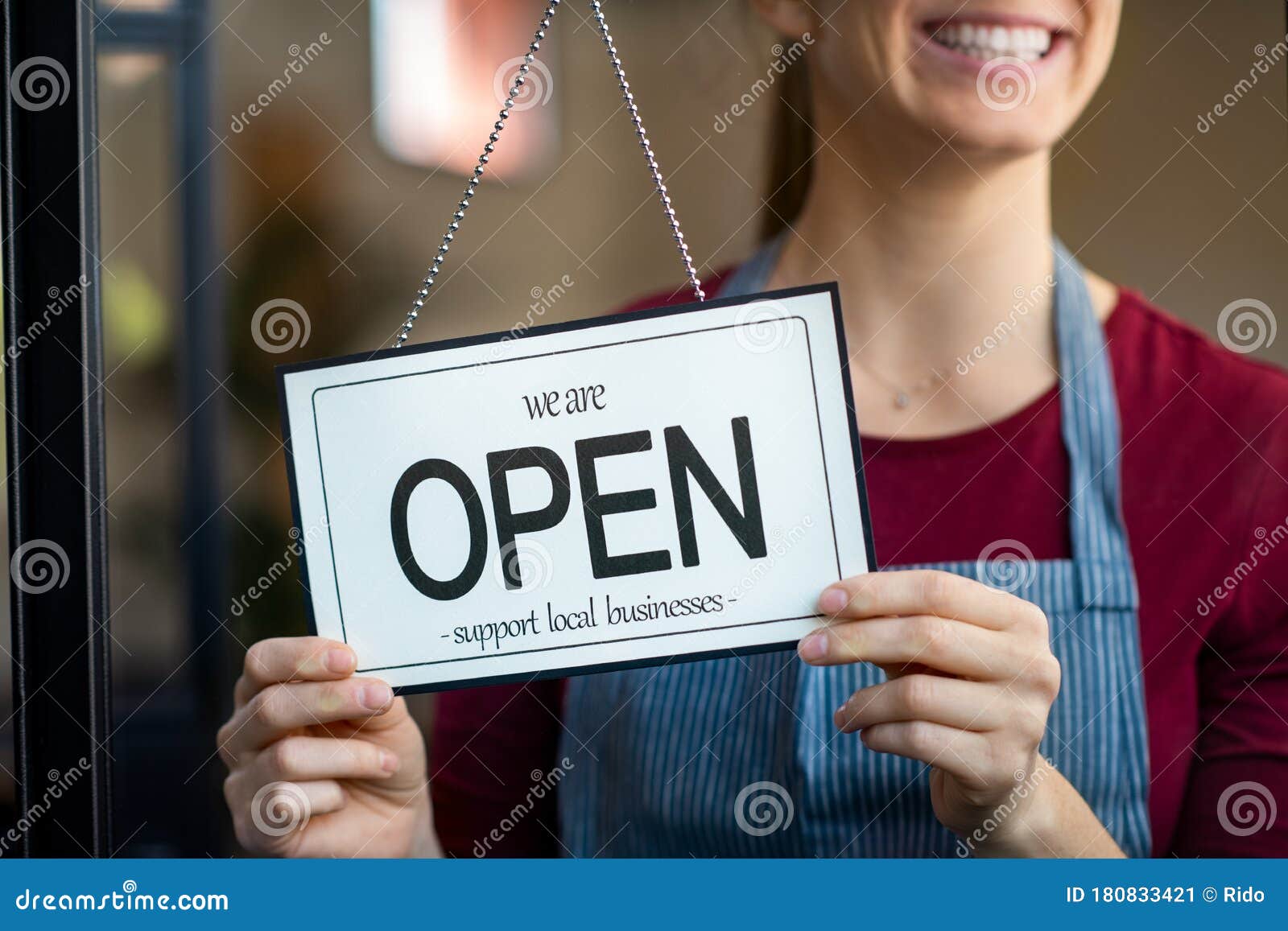 open sign in a small business shop