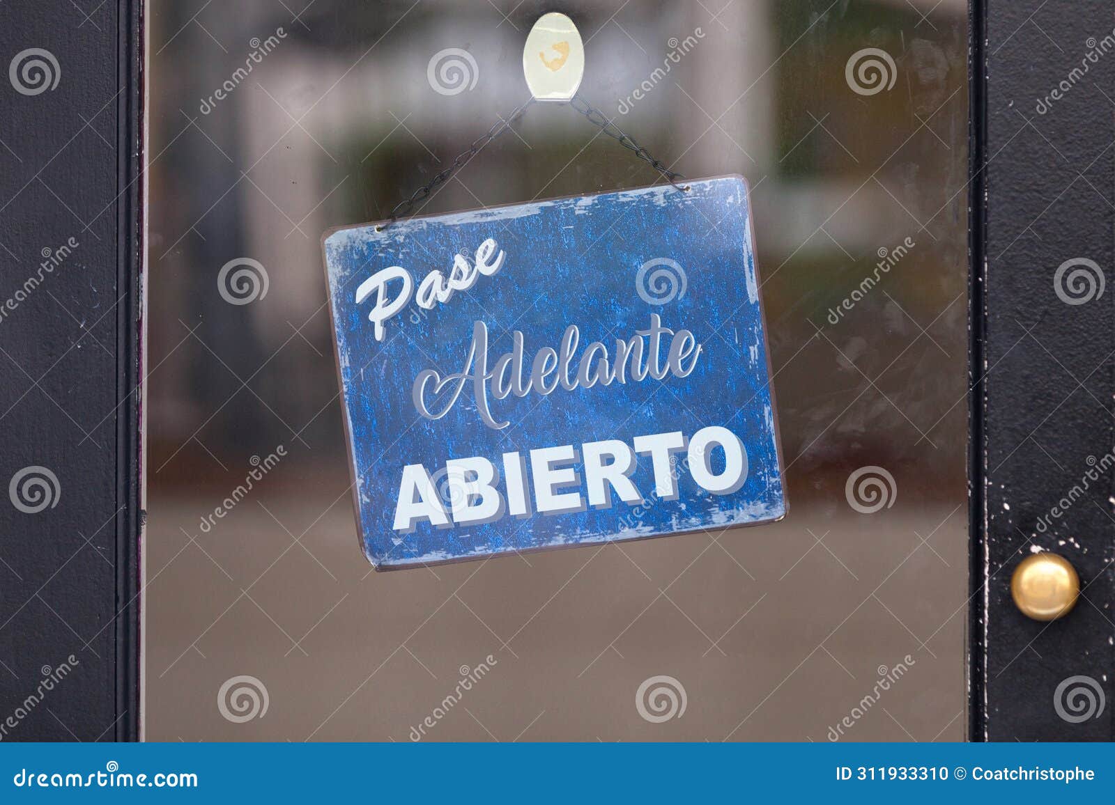 open sign in spanish