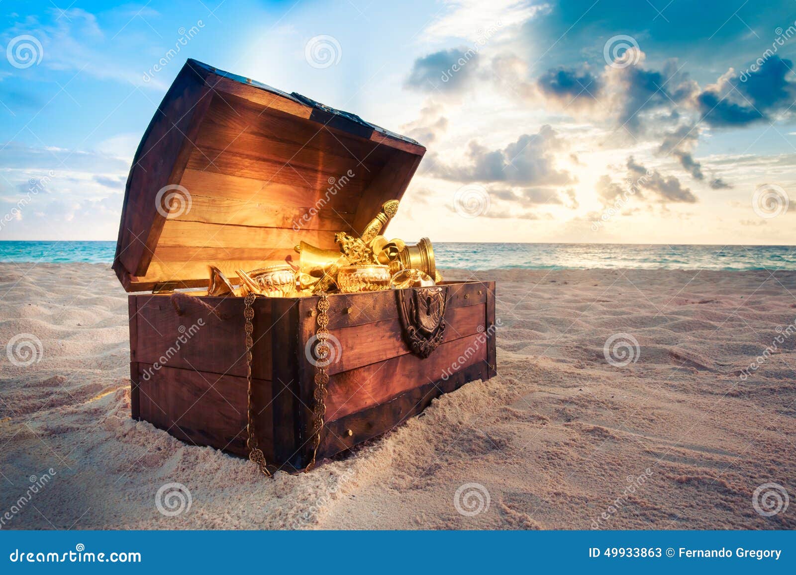 open treasure chest on the beach