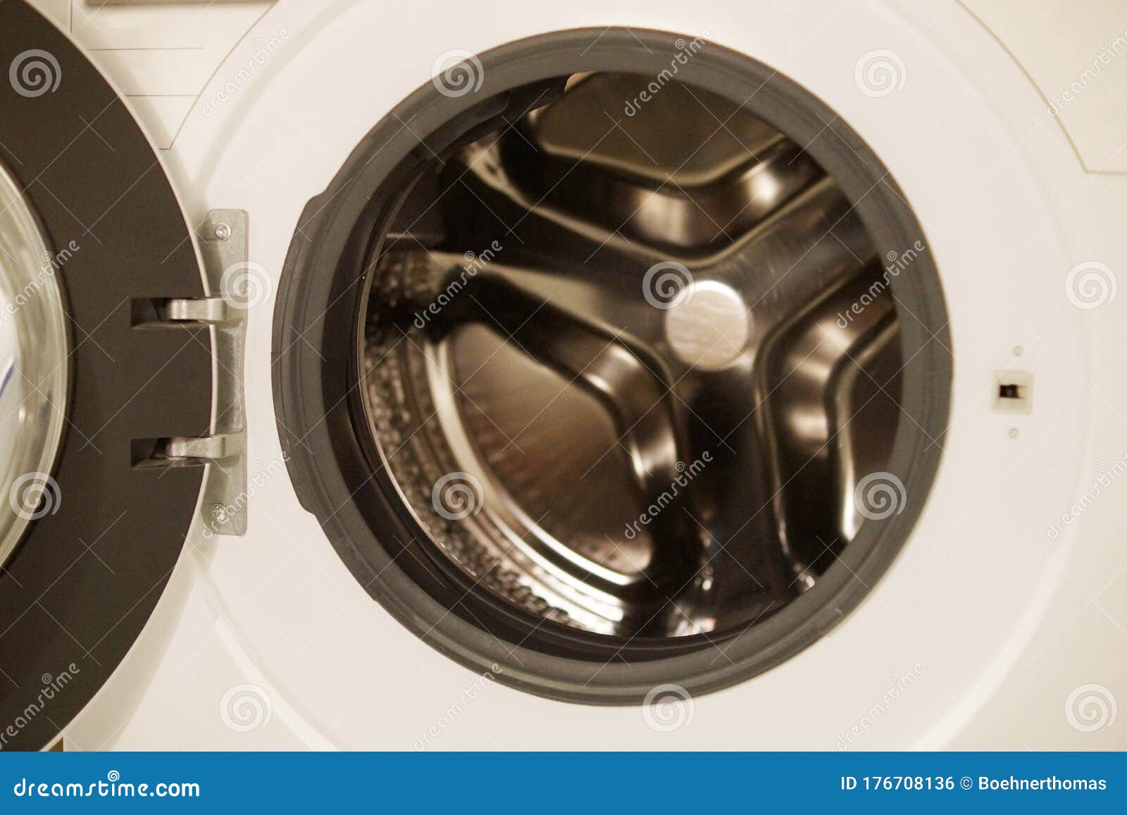 Close Up of Open Washing Machine in Bathroom. Stock Photo Image of