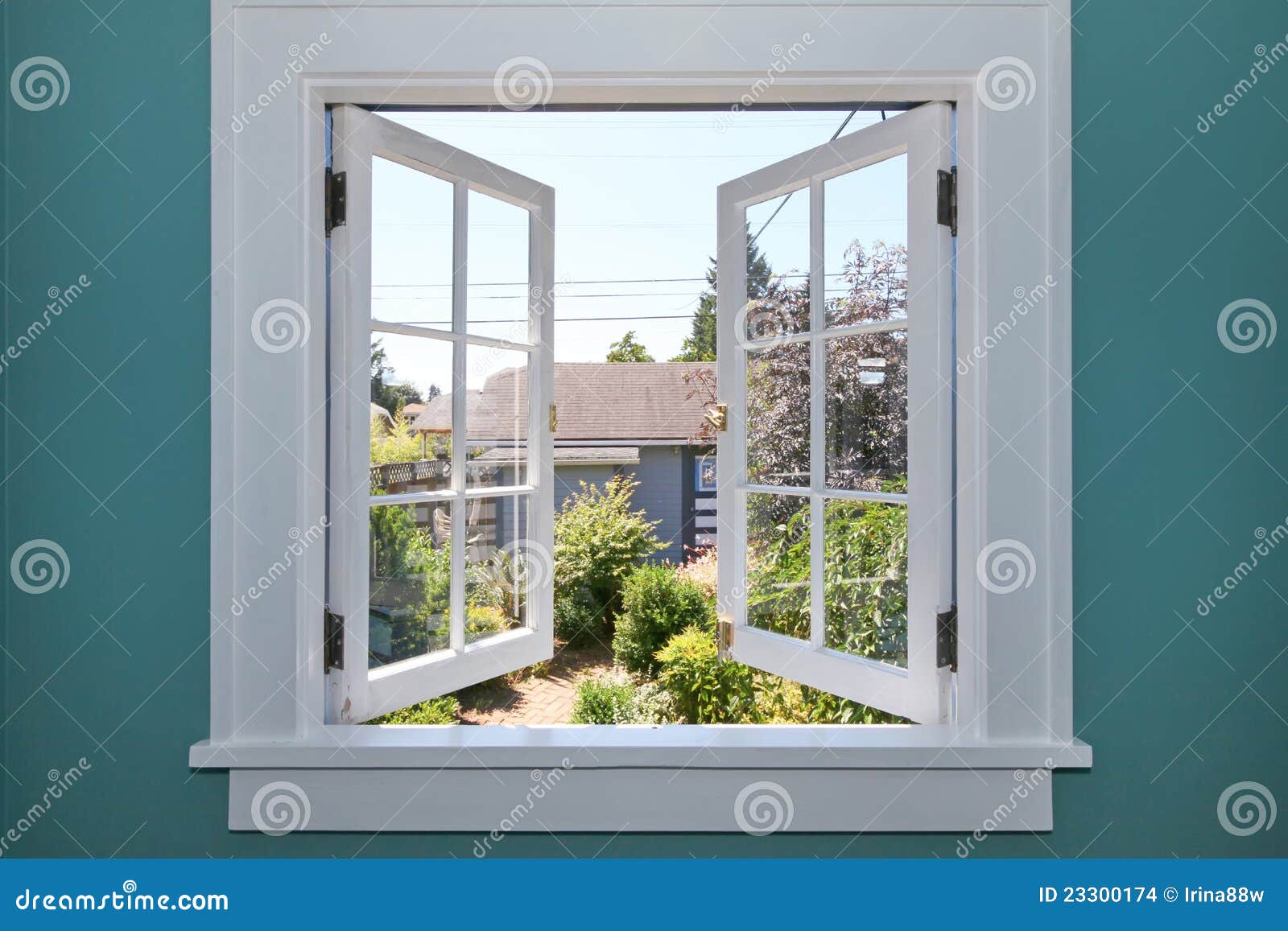 open window to the back yard with small shed. stock images