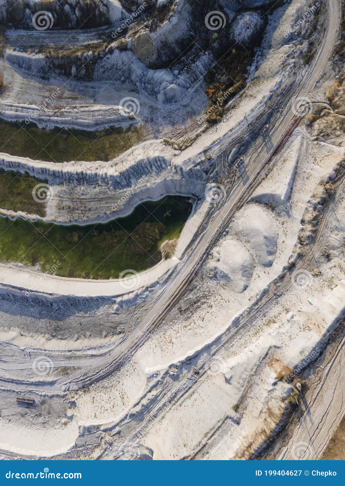 opencast mining quarry - aerial view. industrial extraction of lime, chalk, calx, caol