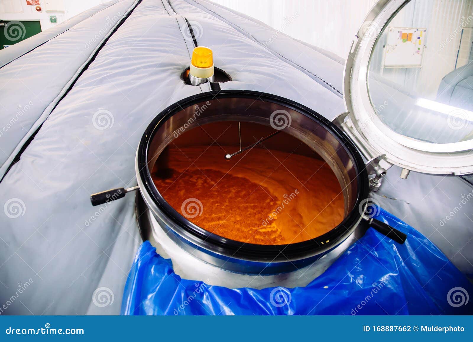 Opened Brewing Vat. Fermentation of Beer Wort Inside Stock Photo