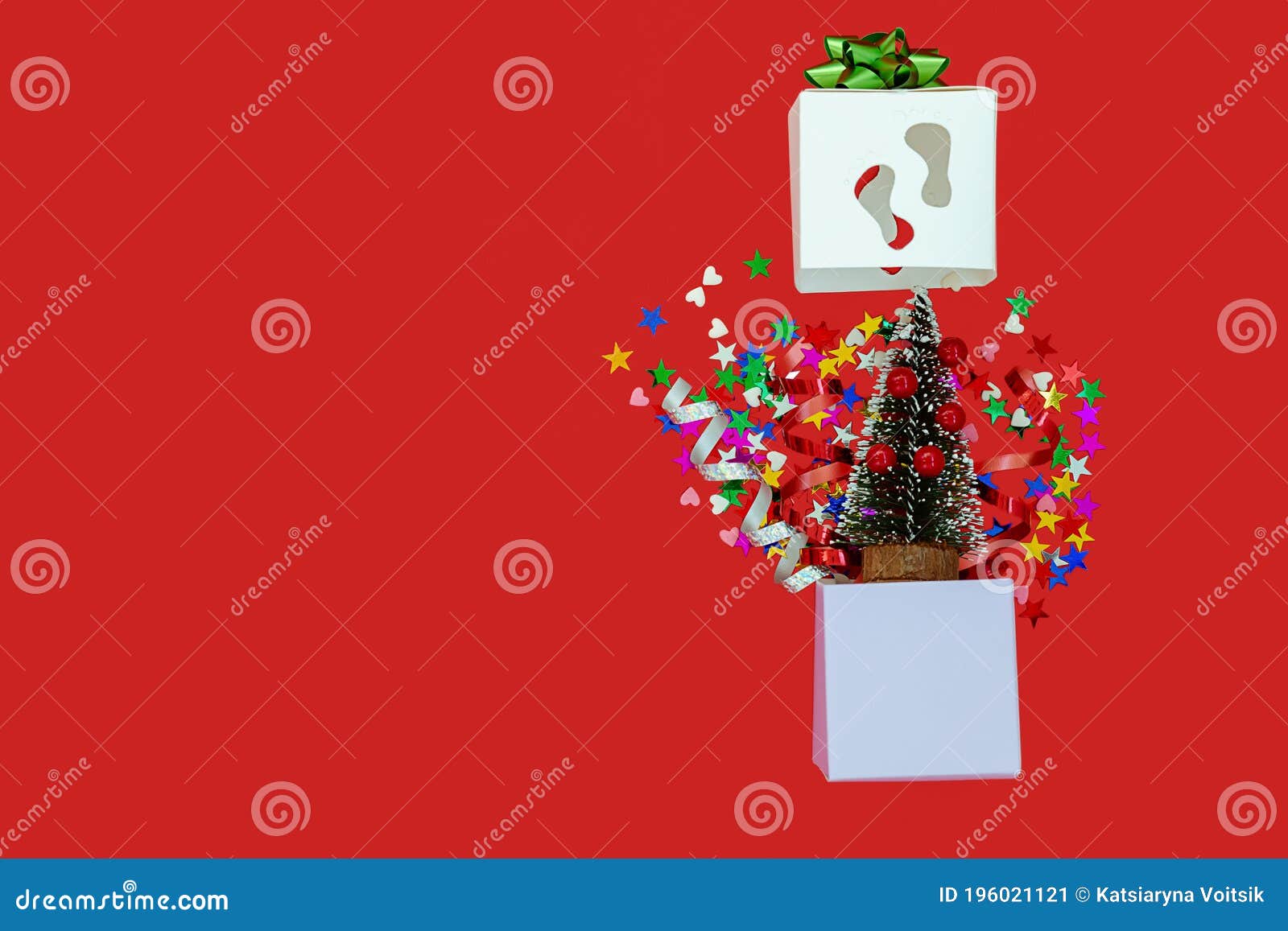 Christmas sweet gift box. Explosion of paper confetti. Open 3d-red