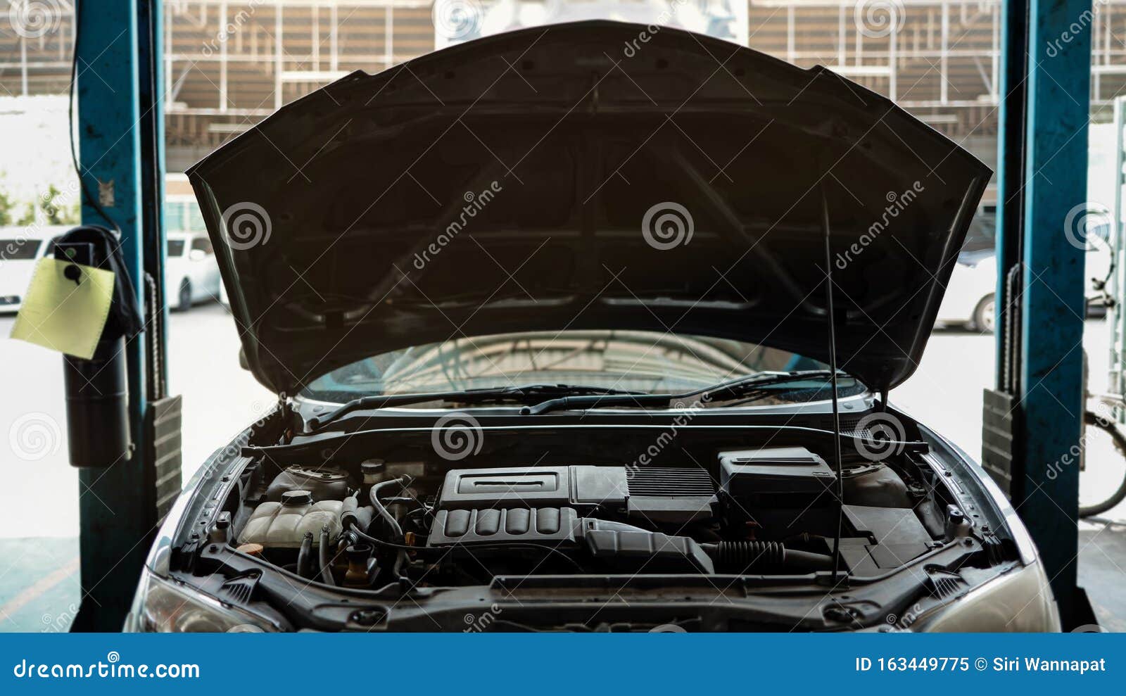 Opened Hood Car at the Repair Station, Fixing Services Stock Image