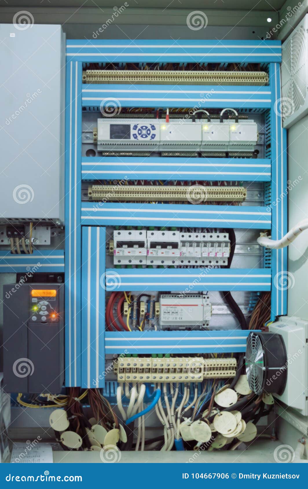 Opened Lowvoltage Control Box for HVAC System on the Wall of the Commercial Ventilation Room