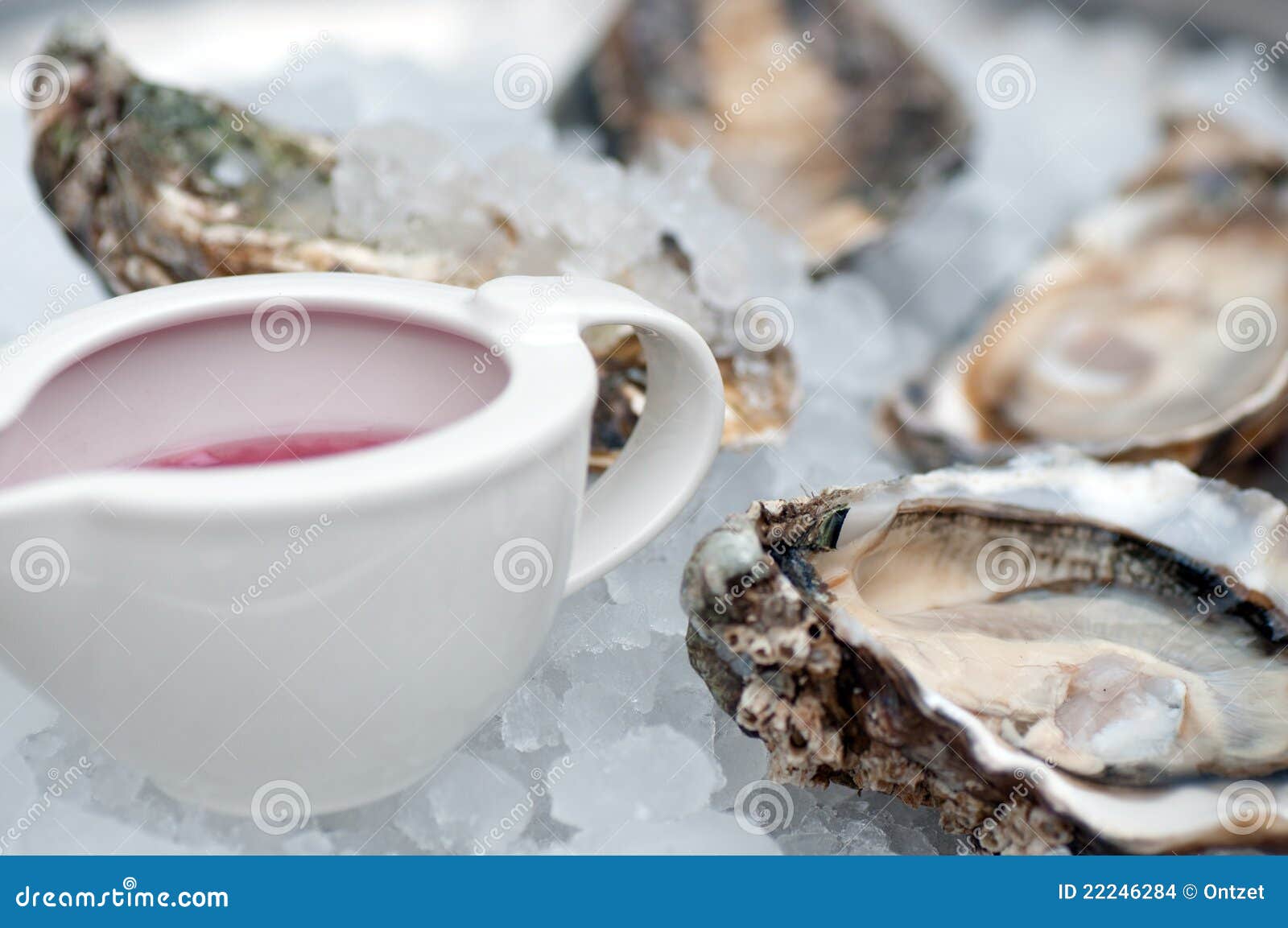 Opened oysters on ice stock photo. Image of fruit, green 22246284