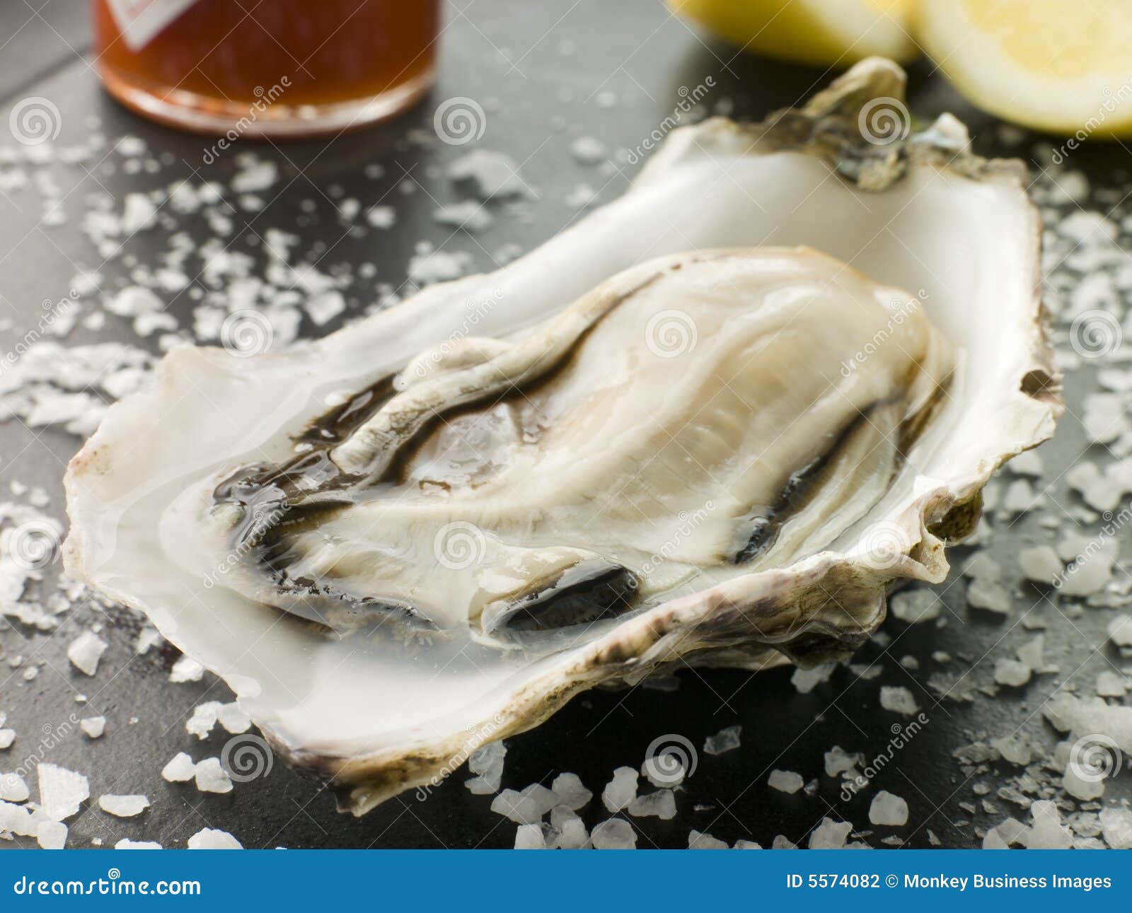 Opened Rock Oyster with Hot Chilli Sauce Stock Photo Image of oyster
