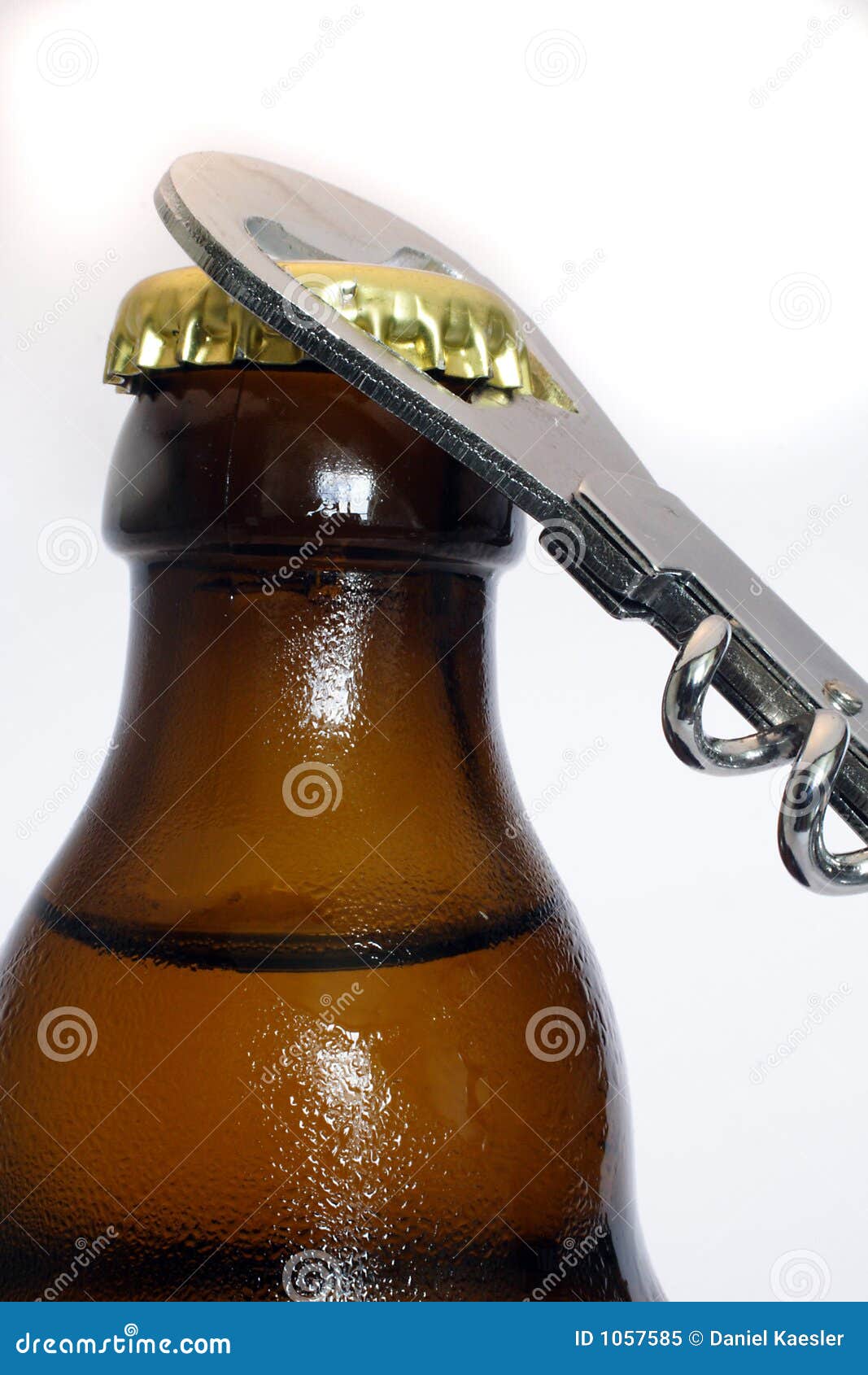 Opening a beer stock image. Image of isolated, beverage 1057585