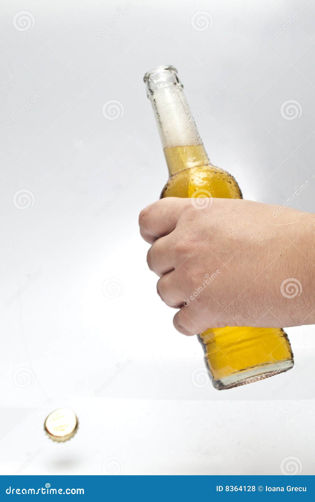 Opening beer stock photo. Image of drops, amber, cool 8364128