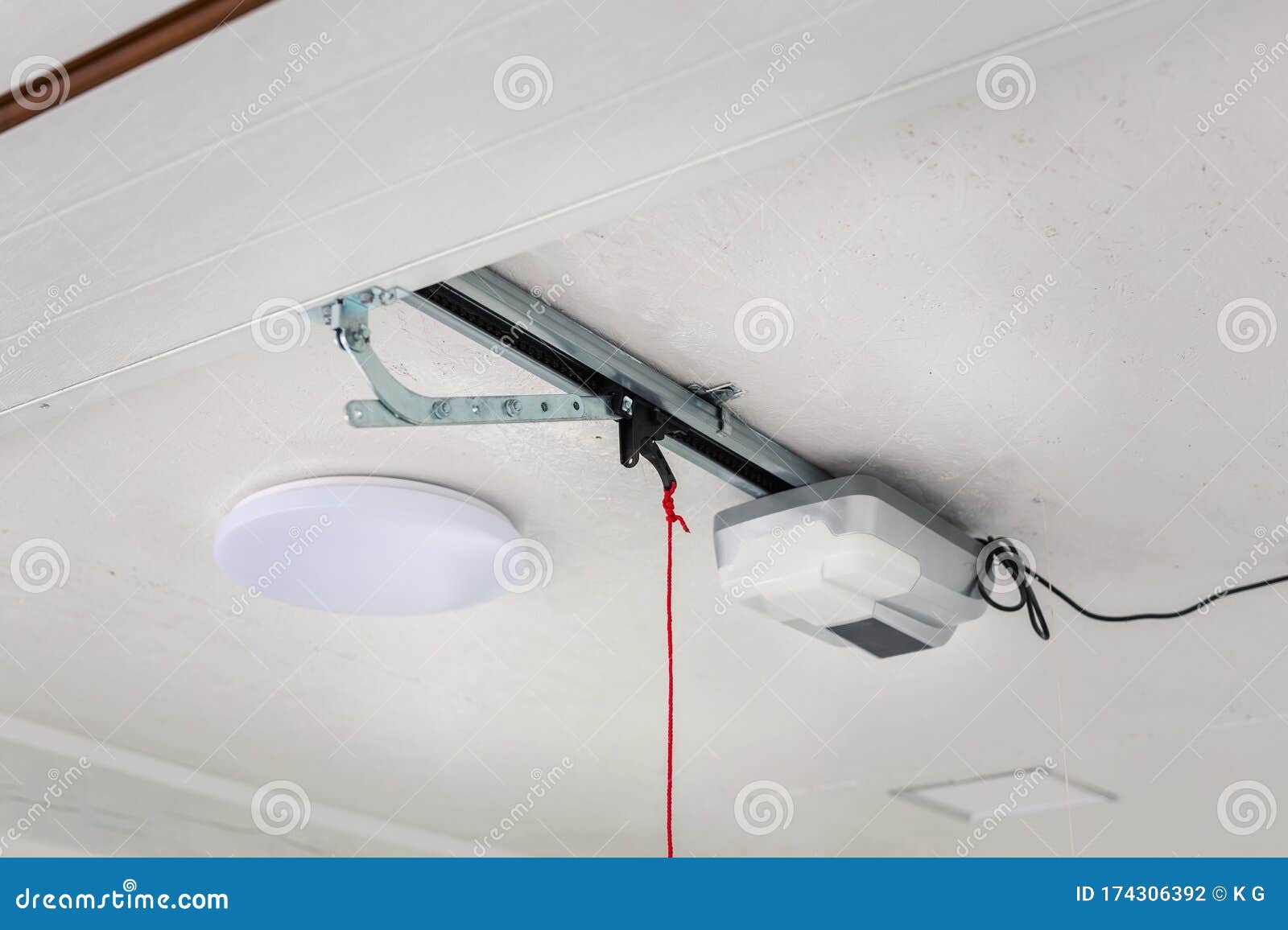 Opening Door And Automatic Garage Door Opener Electric Engine Gear Mounted On Ceiling With Emergency Cord Double Place Empty Stock Photo Image Of Light Floor 174306392