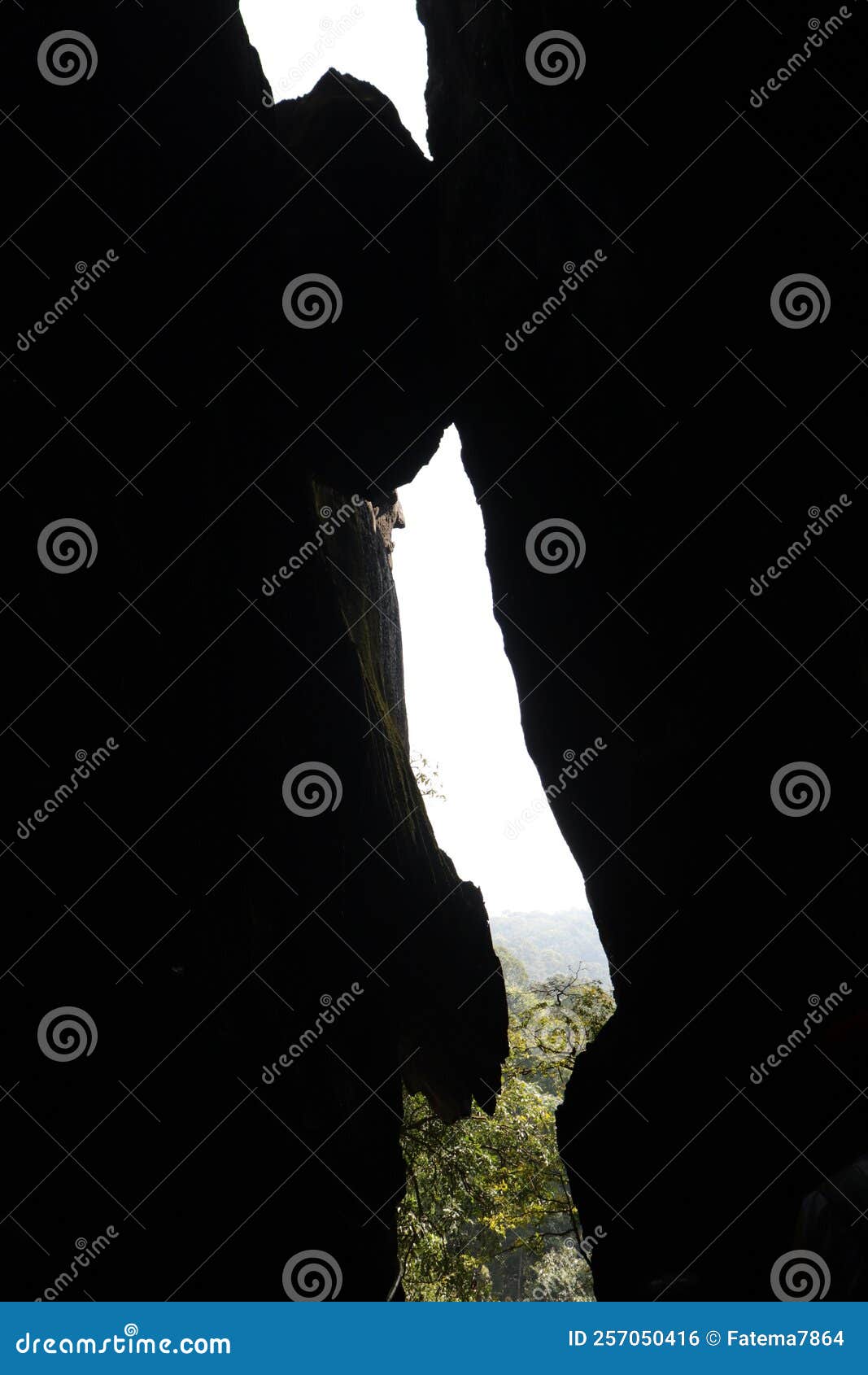 opening showing sky and trees from inside yana caves - karnataka tourism - india adventure trip - hindu mythology