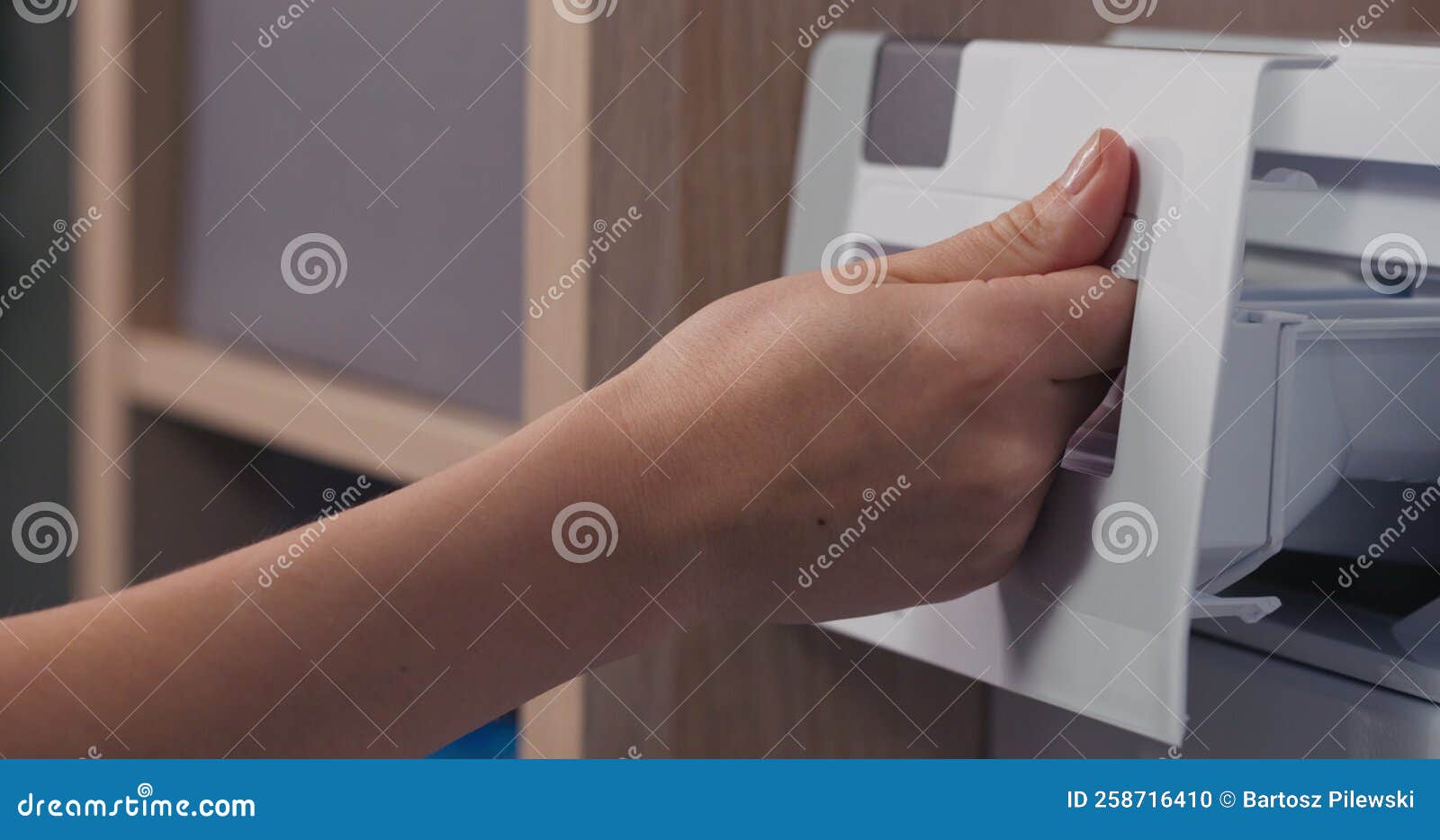 Opening the Washing Machine Drawer of the Rinse Liquid Powder Container