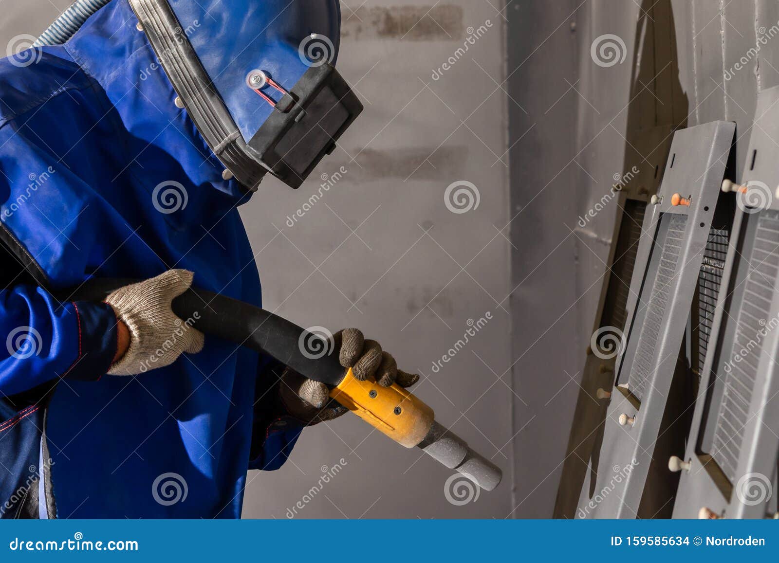 The Operator of the Sandblasting Machine is Ready To Go. the Worker is