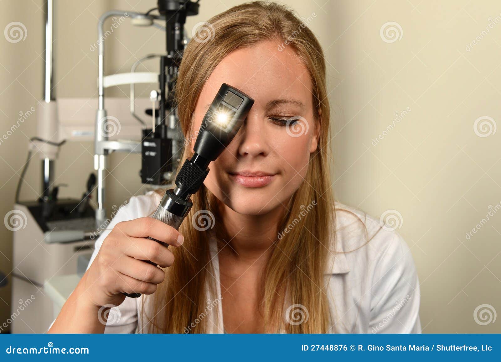 Ophthalmologist Looking through Ophthalmoscope Stock Photo Image of