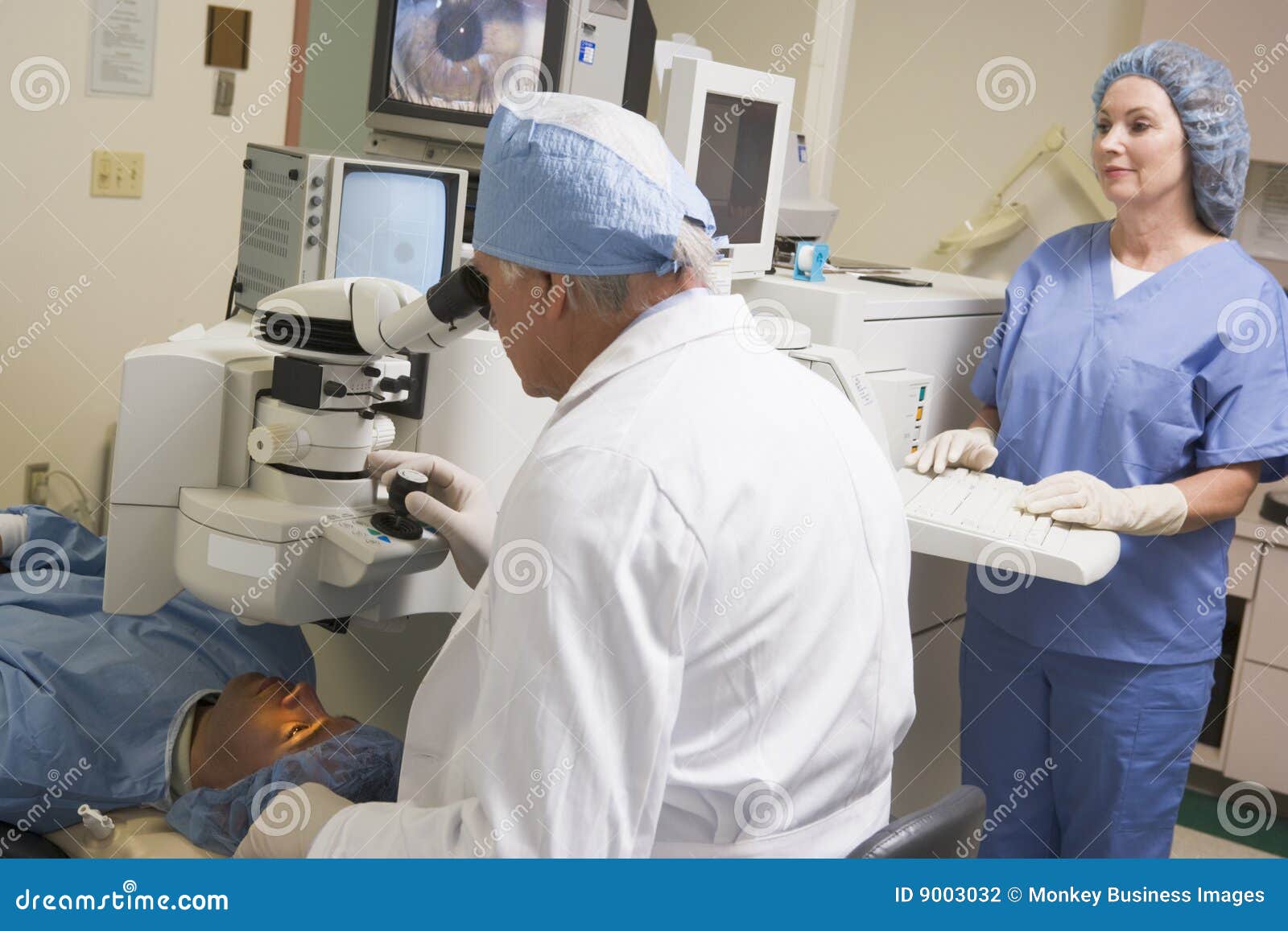 opthamologist performing laser eye treatment