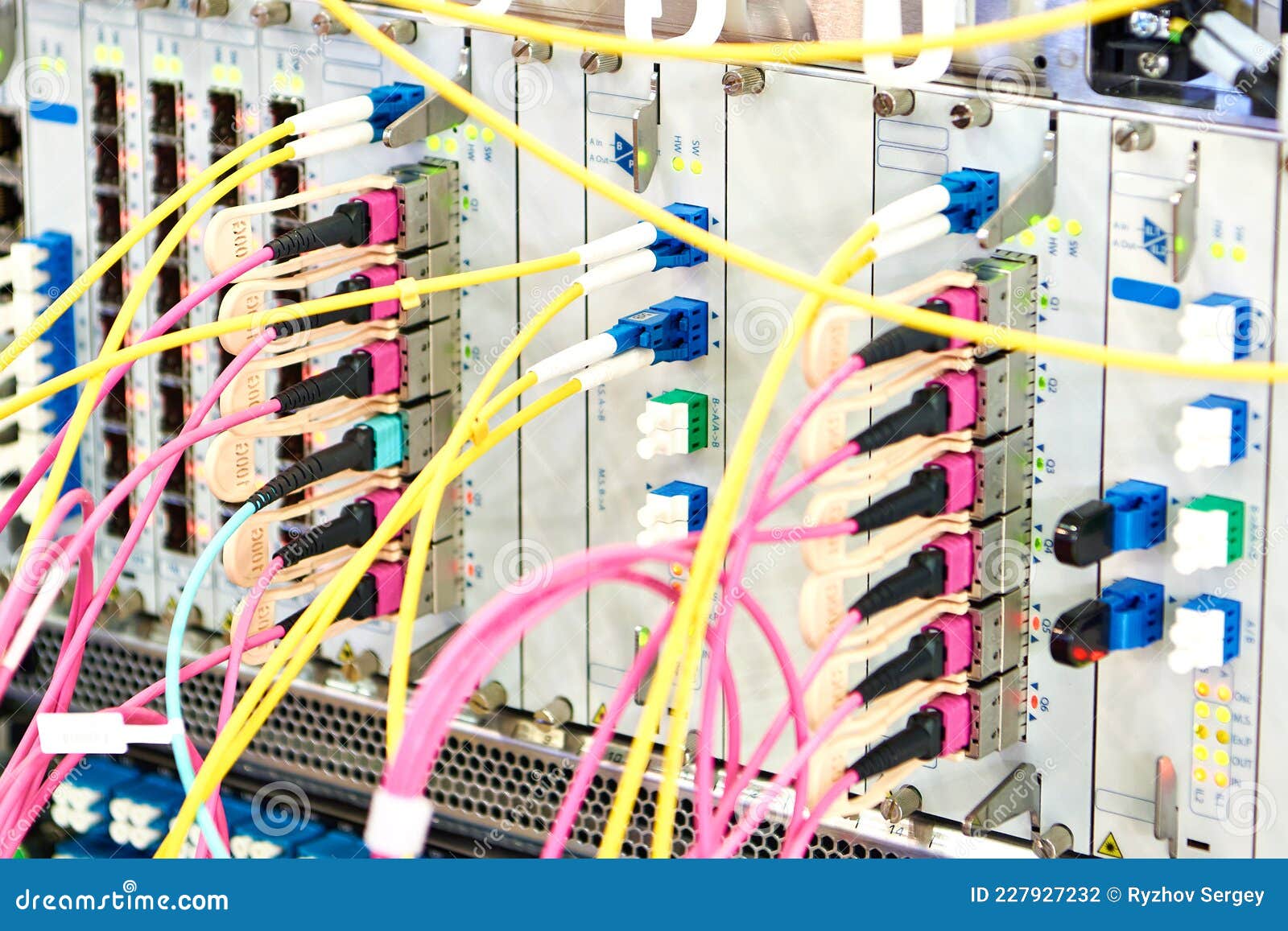 Optical Transport Systems. Fiber Optic Cables on Switch Stock Photo