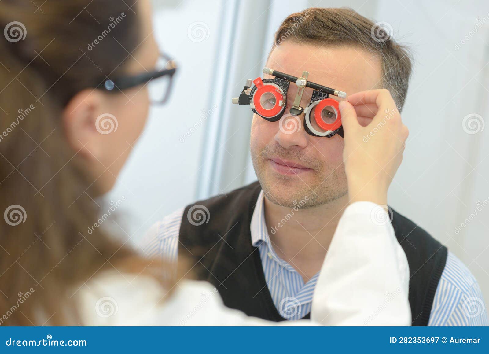Optician Fitting Lens into Testing Glasses Stock Image Image of care